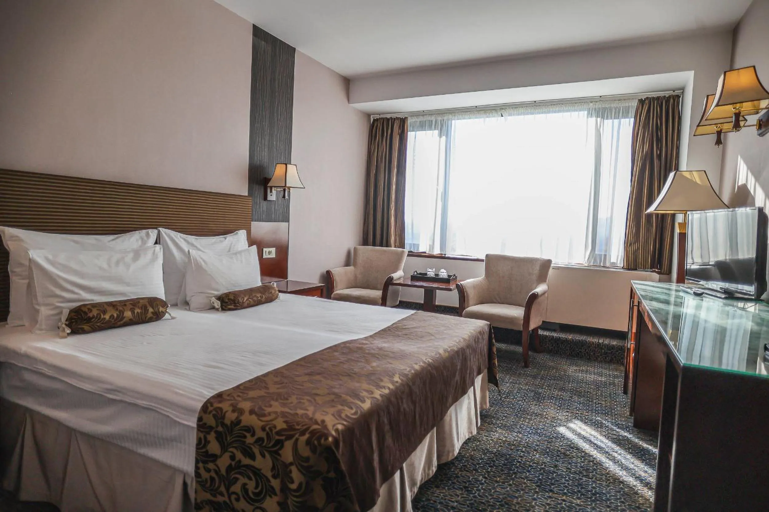 Bed in Grand Hotel Napoca