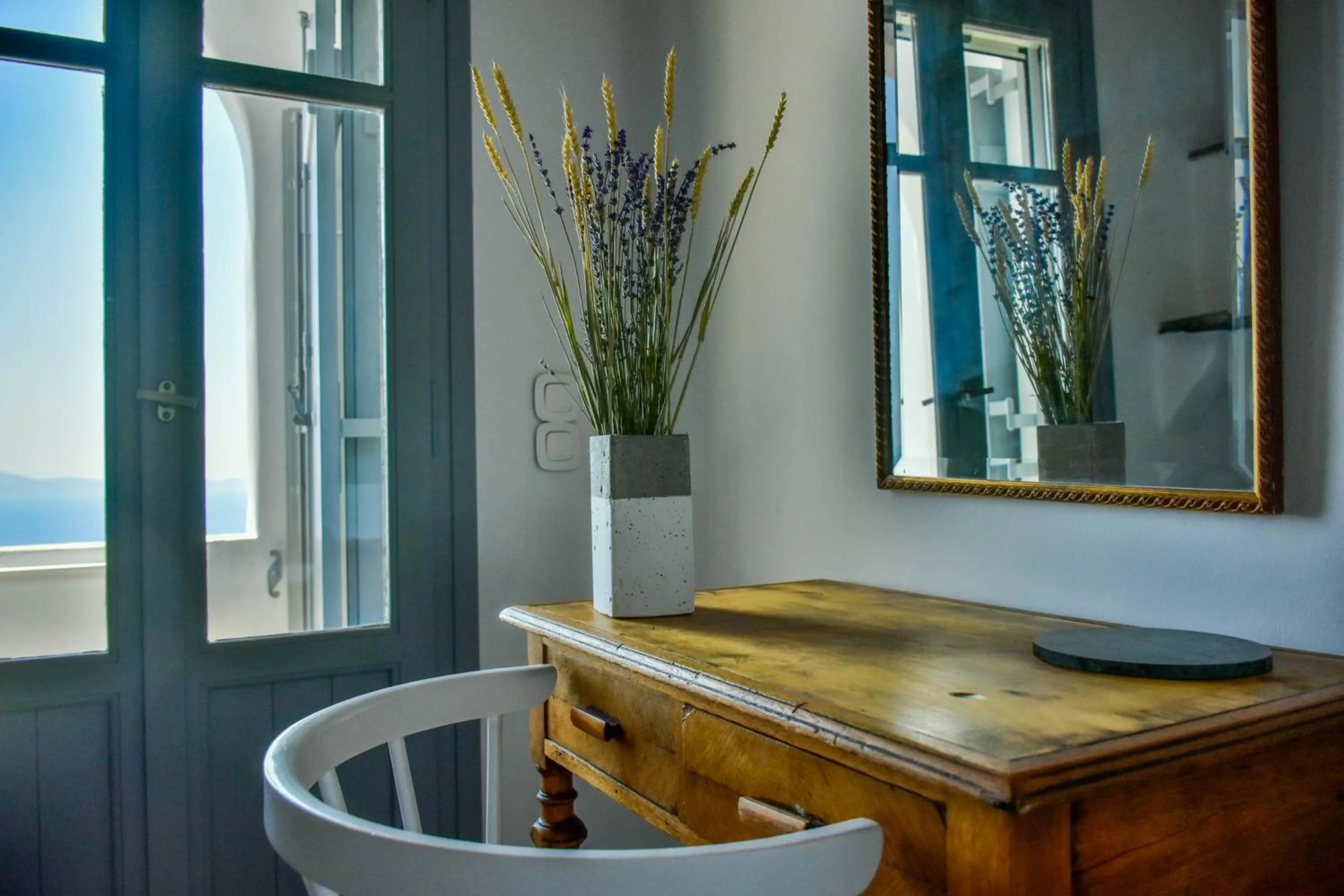 Seating area in Living Theros Luxury Suites