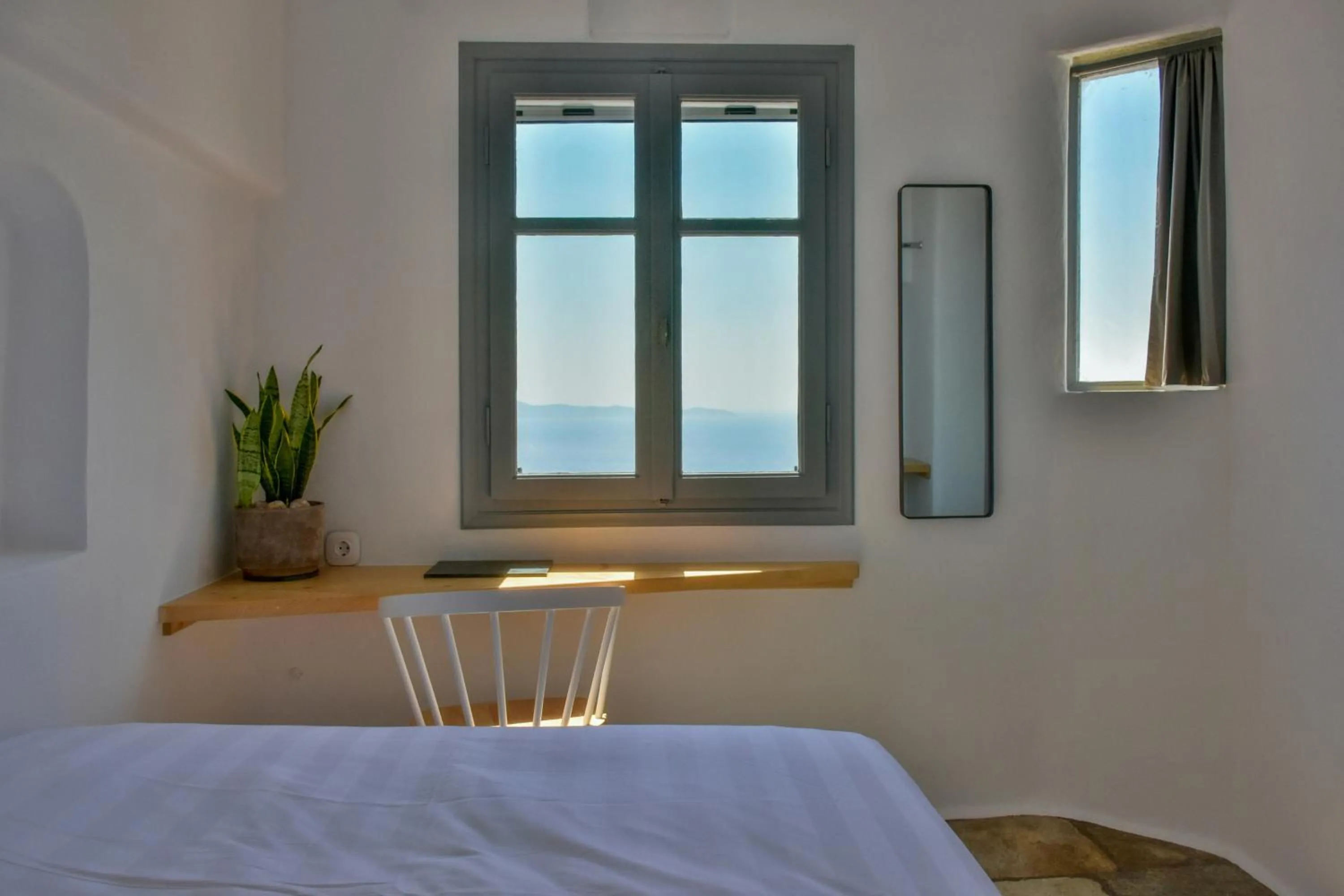 Bedroom, Bed in Living Theros Luxury Suites