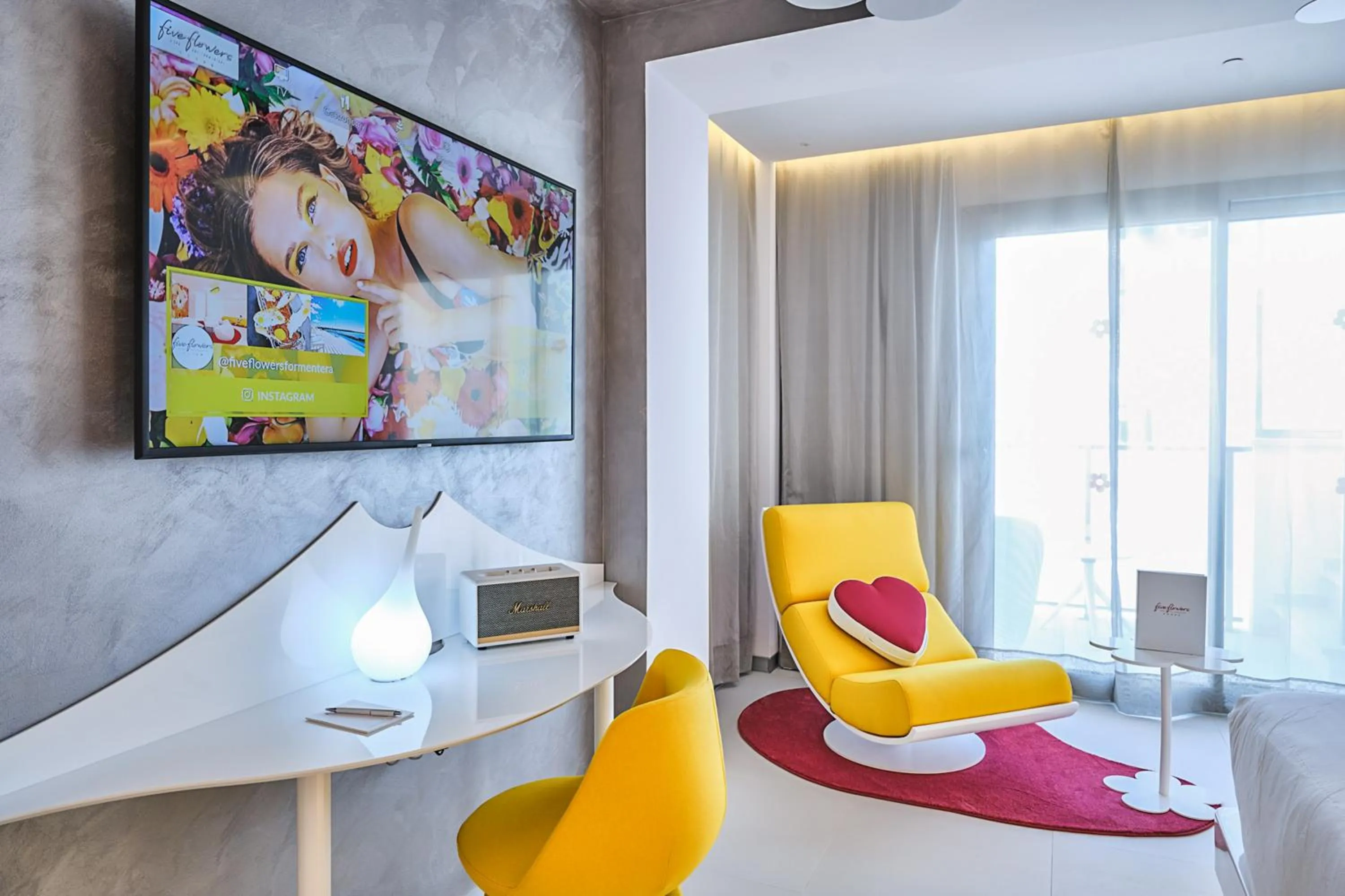 Communal lounge/ TV room in Five Flowers Hotel Formentera, member of Melia Collection