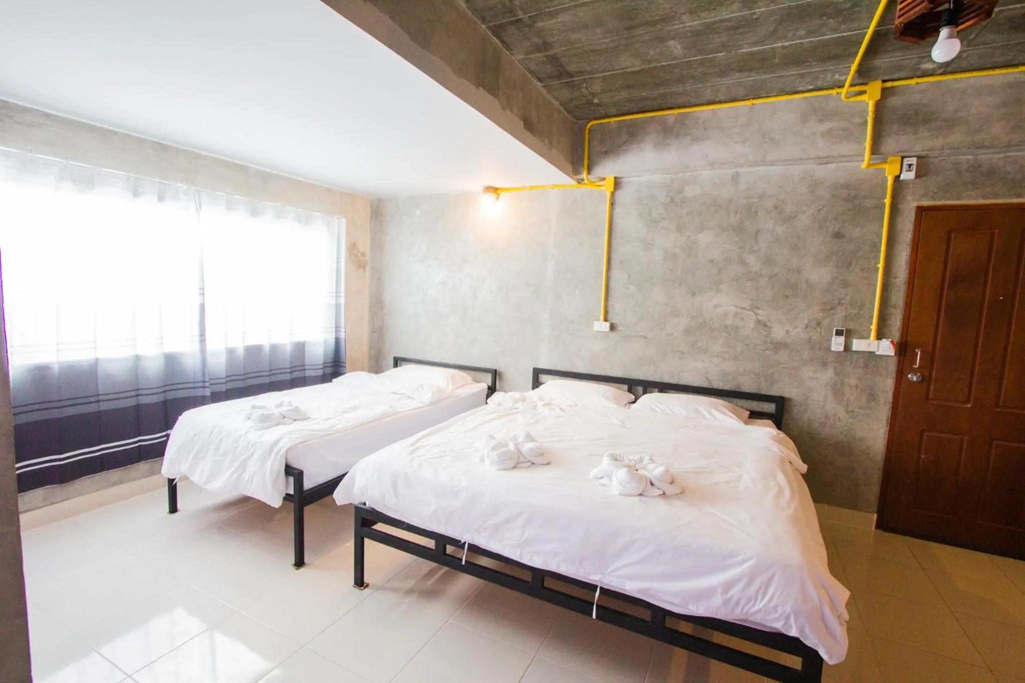 Bed in The Sky Loft Hotel