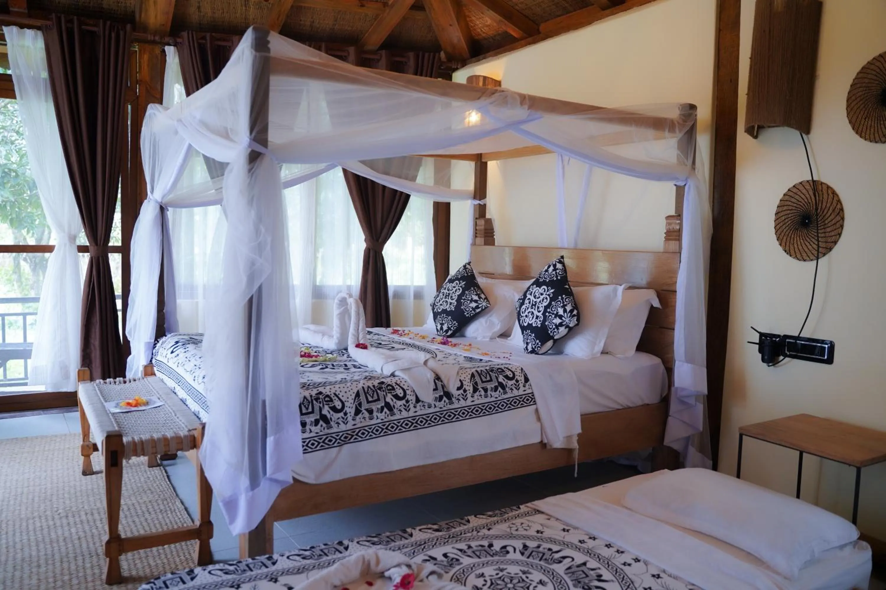 Bed in Sapana Village Lodge