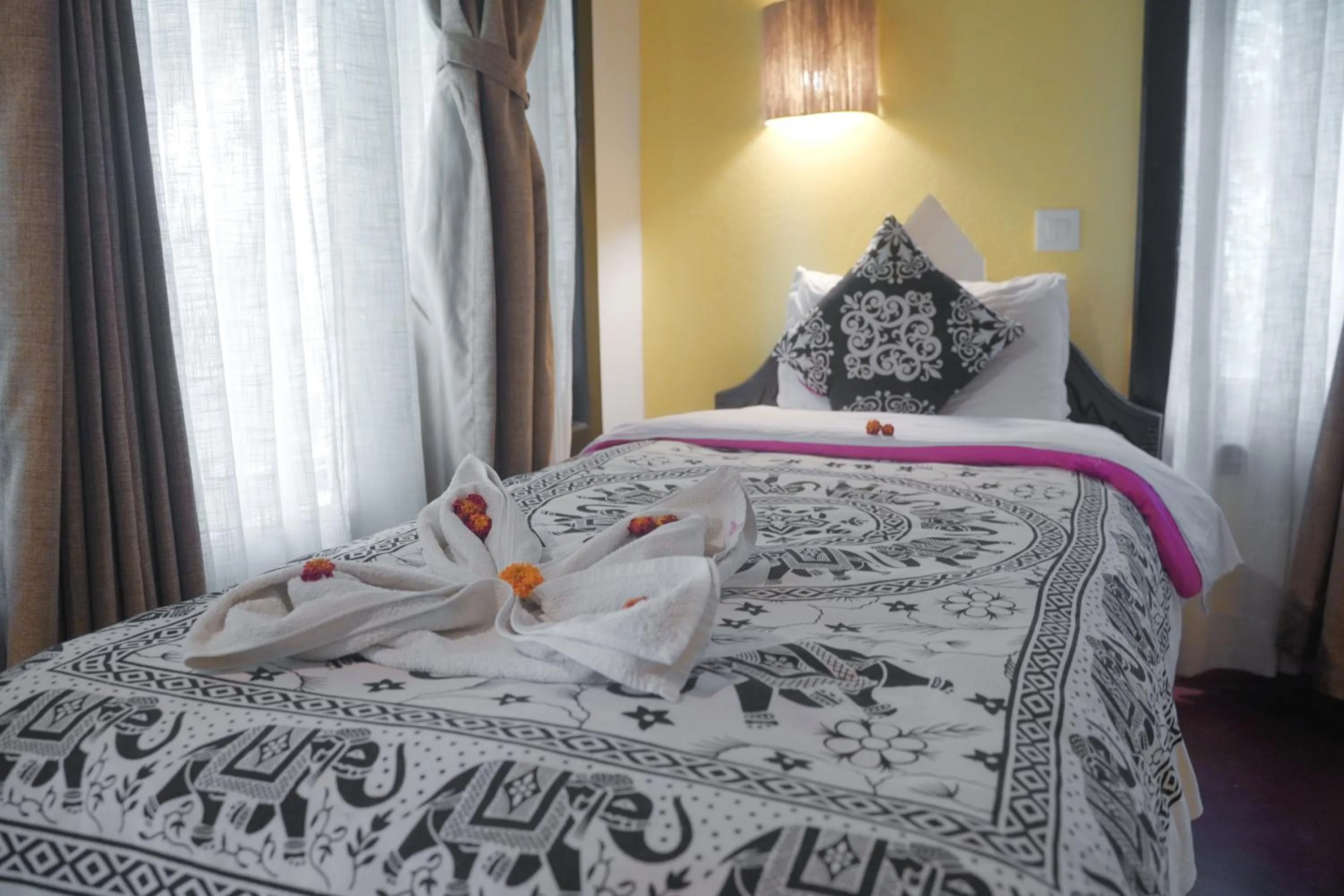 Bed in Sapana Village Lodge