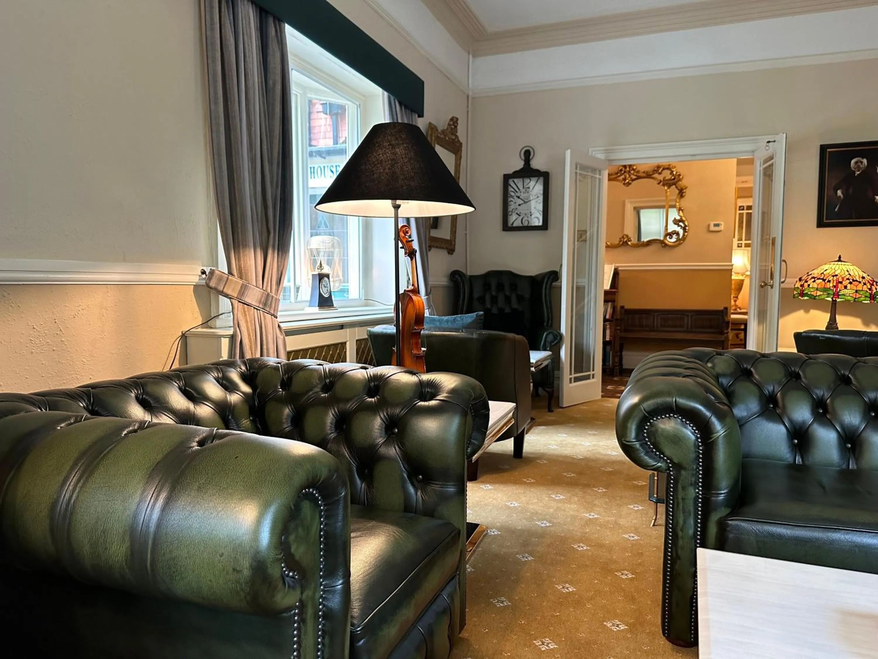 Communal lounge/ TV room in Chester House Guest House