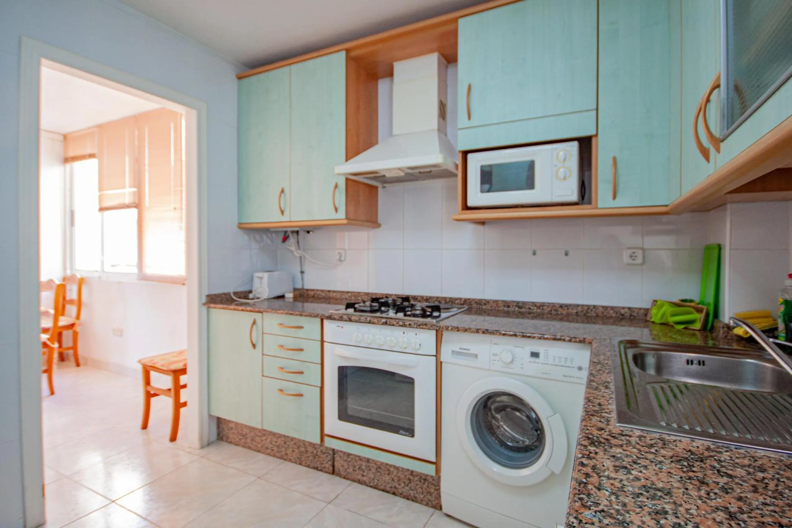 Kitchen or kitchenette in Inmovecos apart con piscina Alisios 227