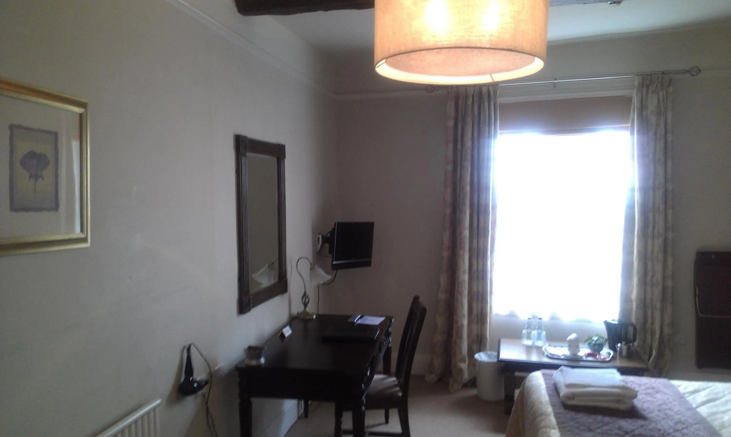 Decorative detail, Bed in The Kings Head Hotel