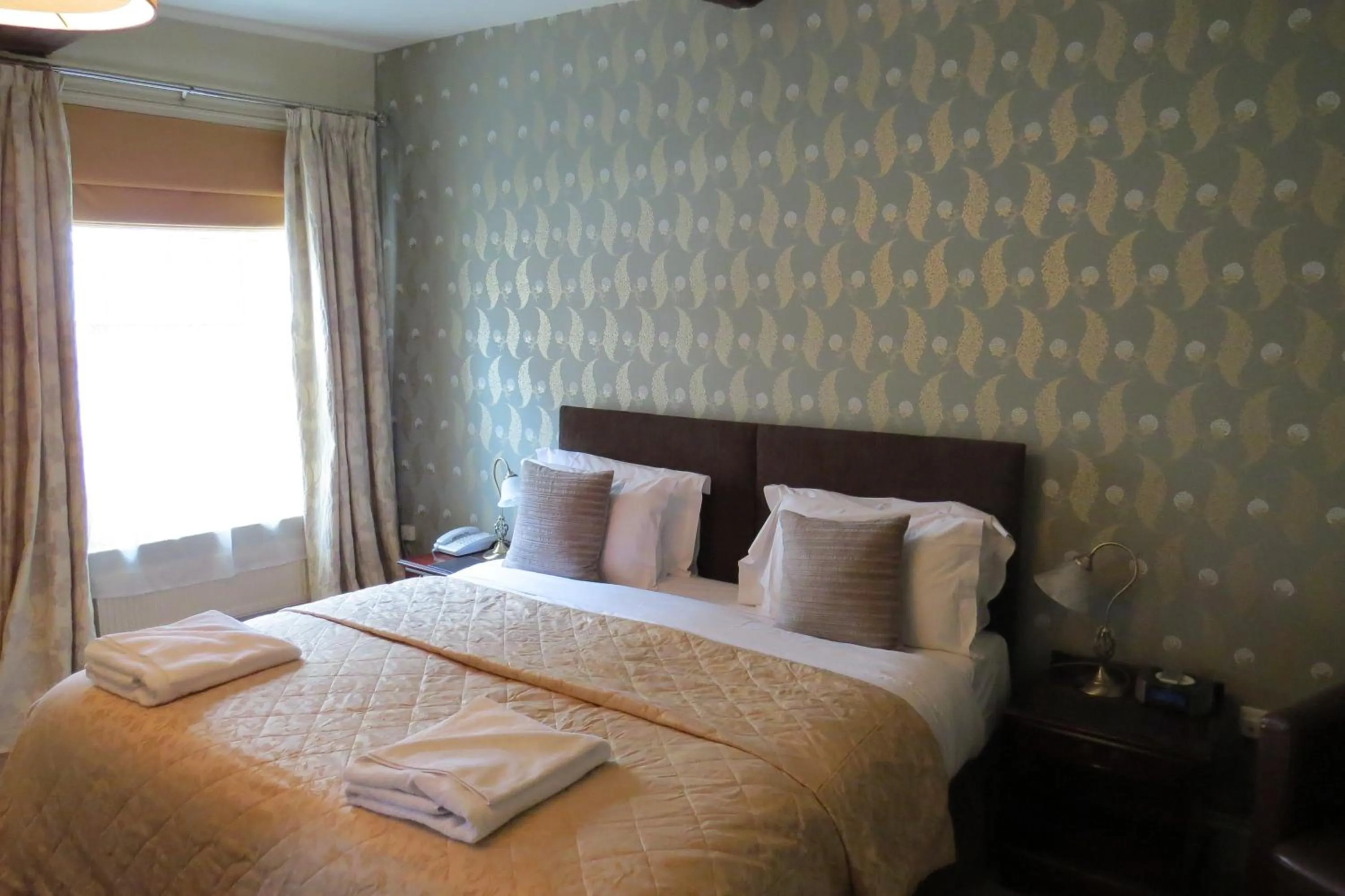 Bed in The Kings Head Hotel