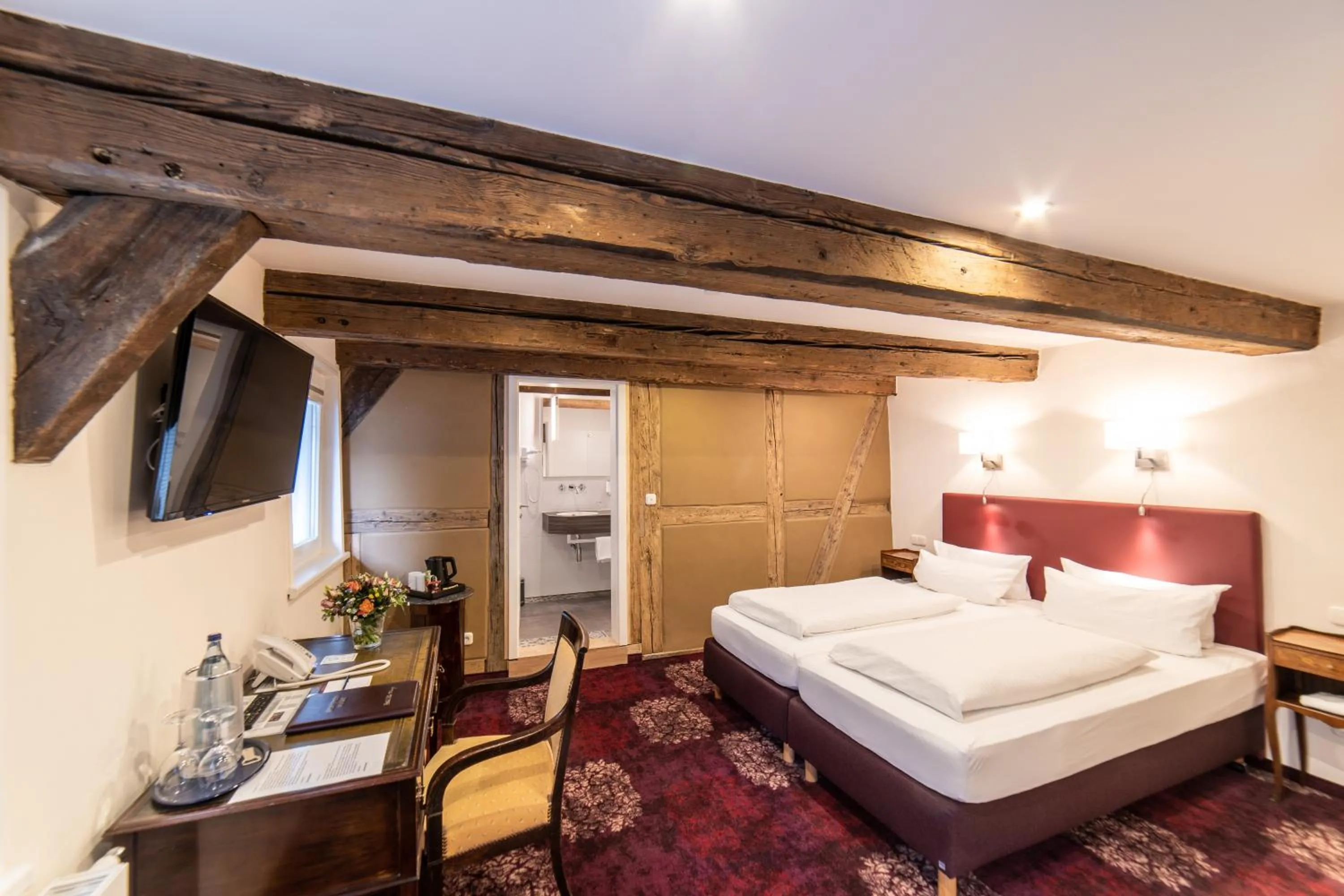 Photo of the whole room, Bed in Romantik Hotel Alte Münze