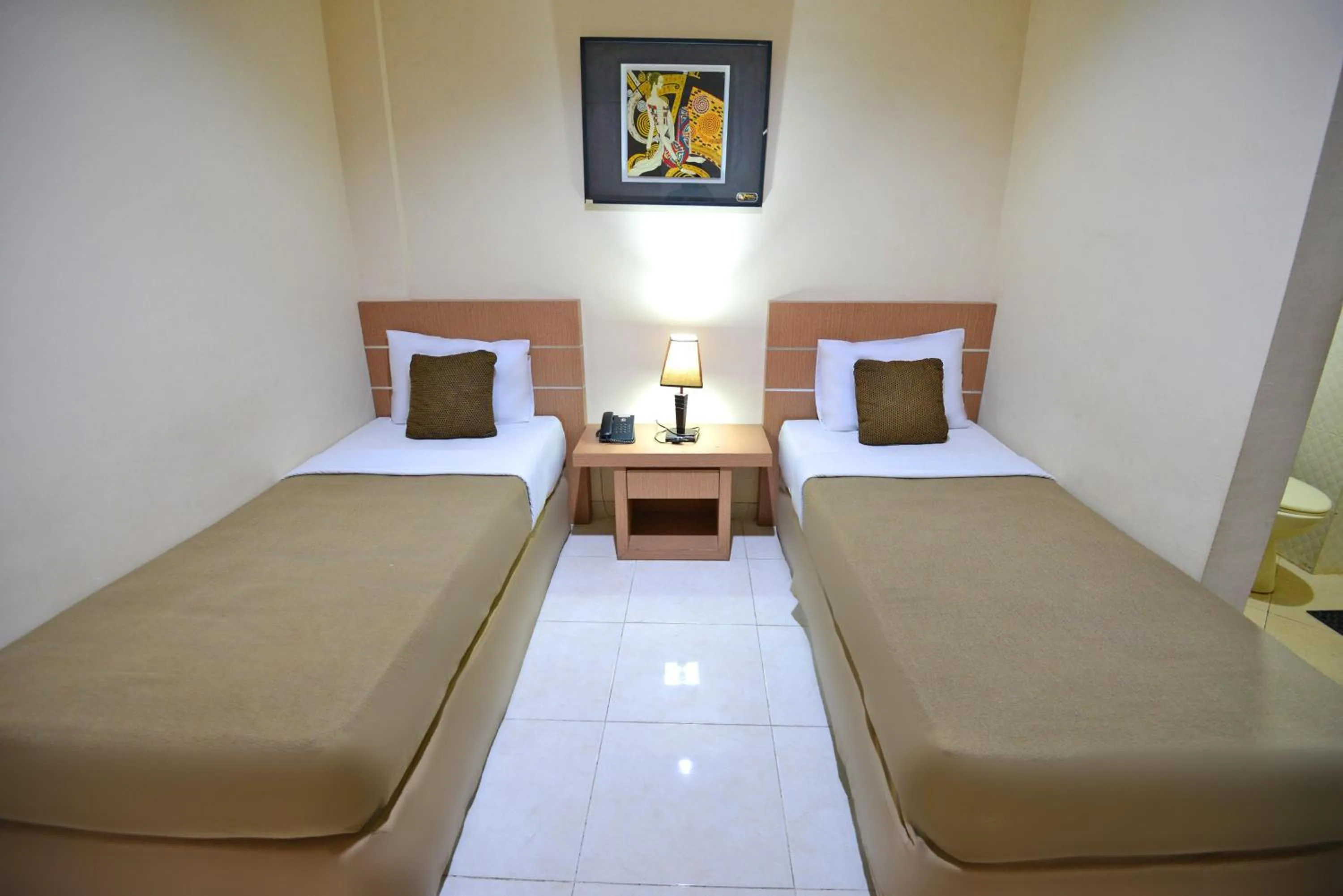 Bed in Hotel Graha DPT 33