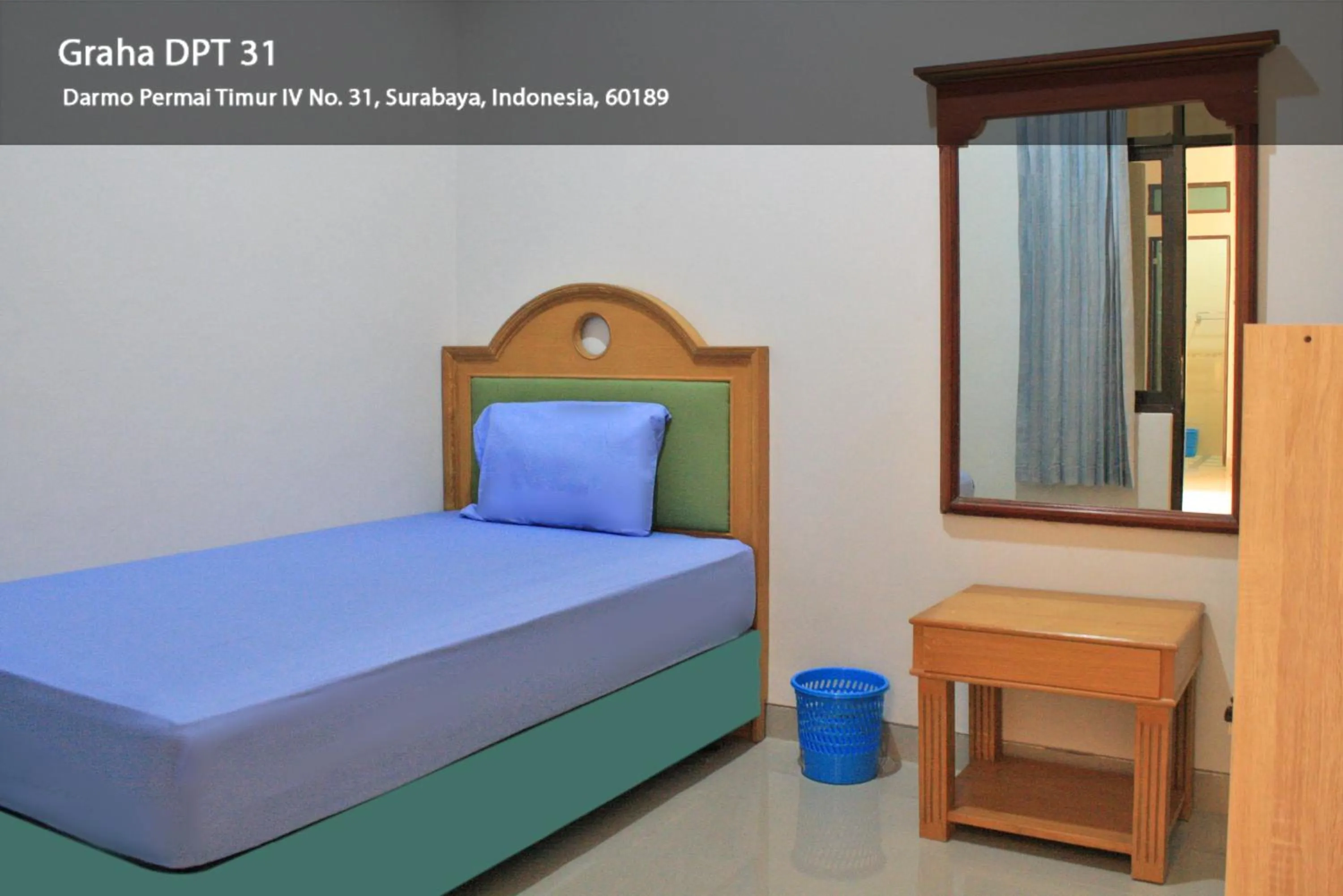 Bed in Hotel Graha DPT 33