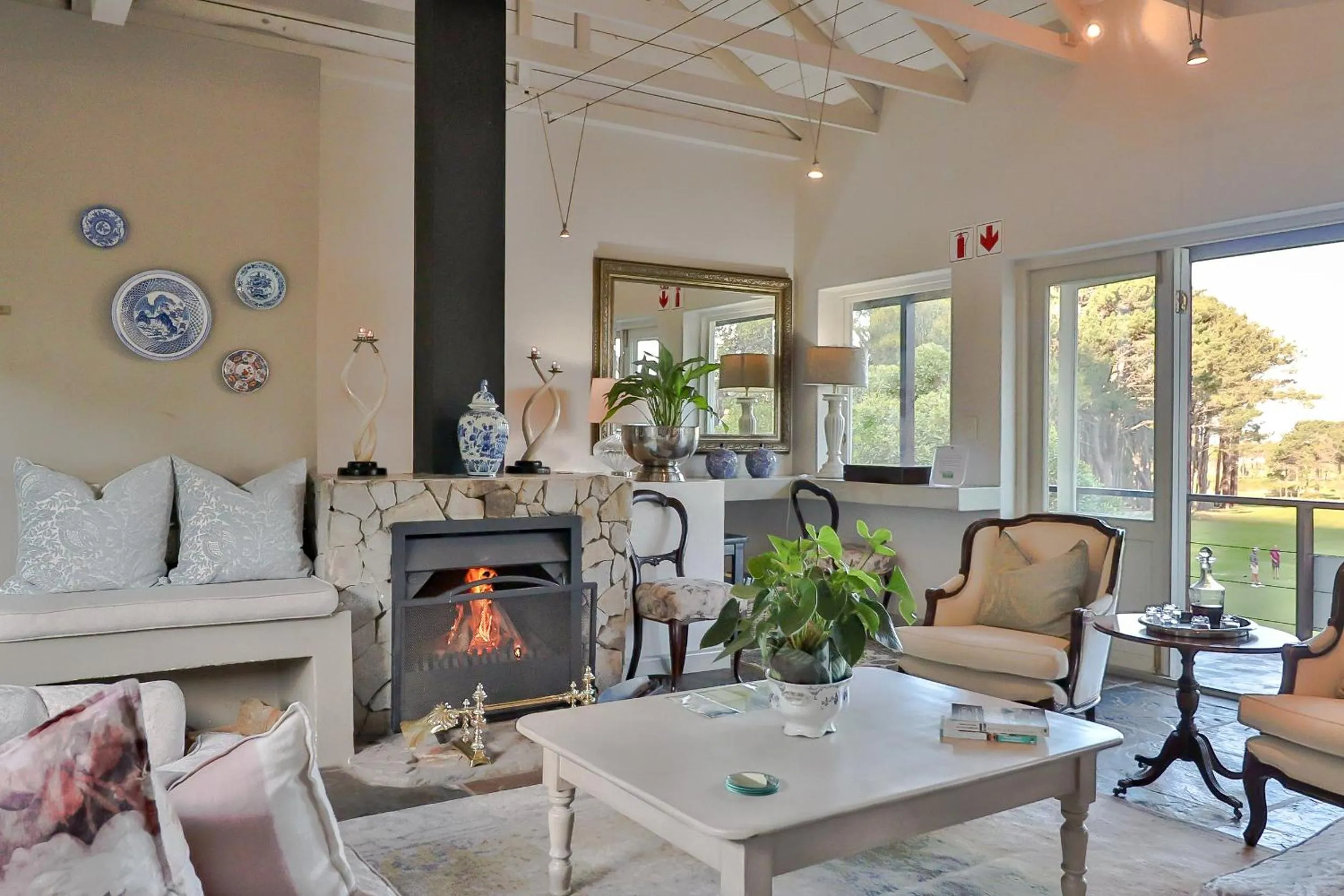 Communal lounge/ TV room in Hermanus Lodge on the Green - Solar Power