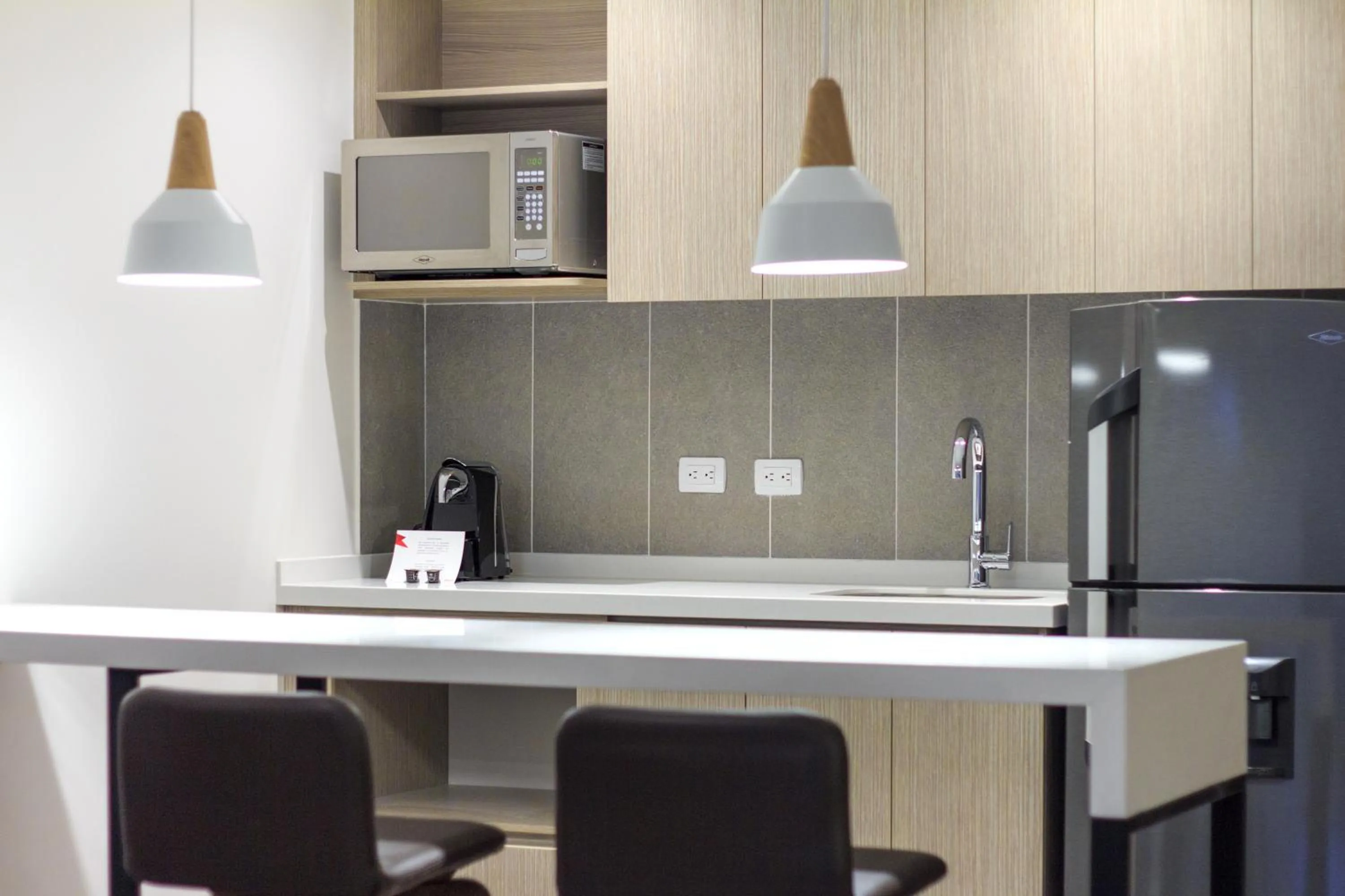 Kitchen or kitchenette in Novotel Medellin El Tesoro