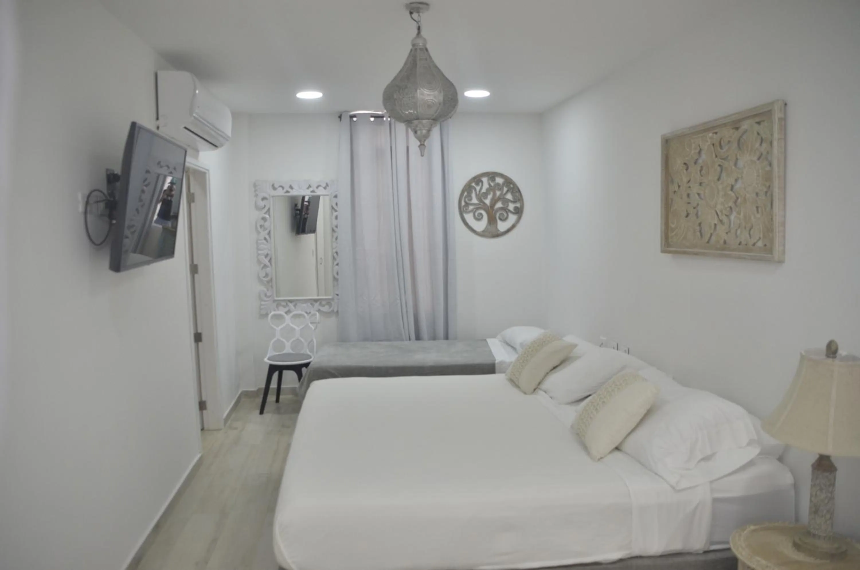 Bed in Le Castel Blanc Hotel Boutique