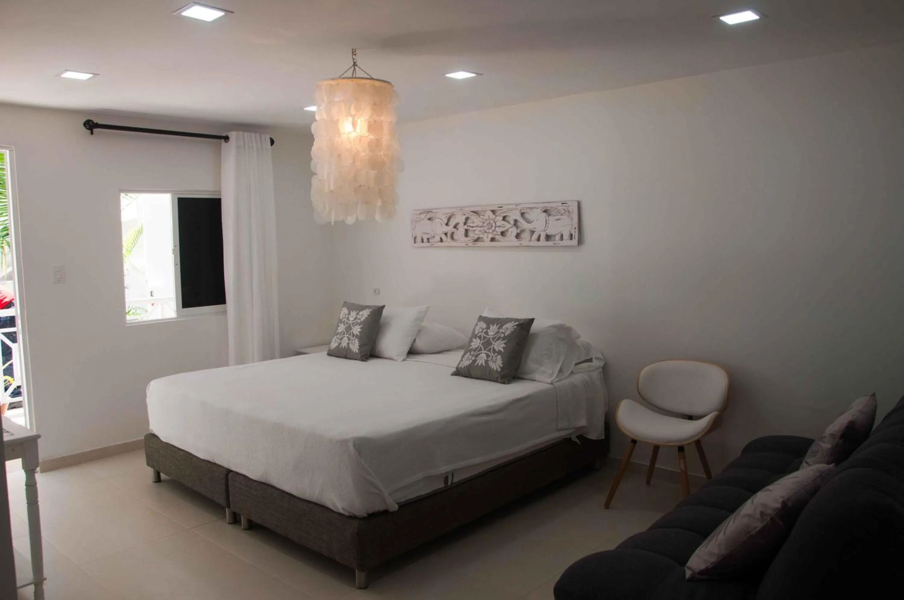 Bed in Le Castel Blanc Hotel Boutique