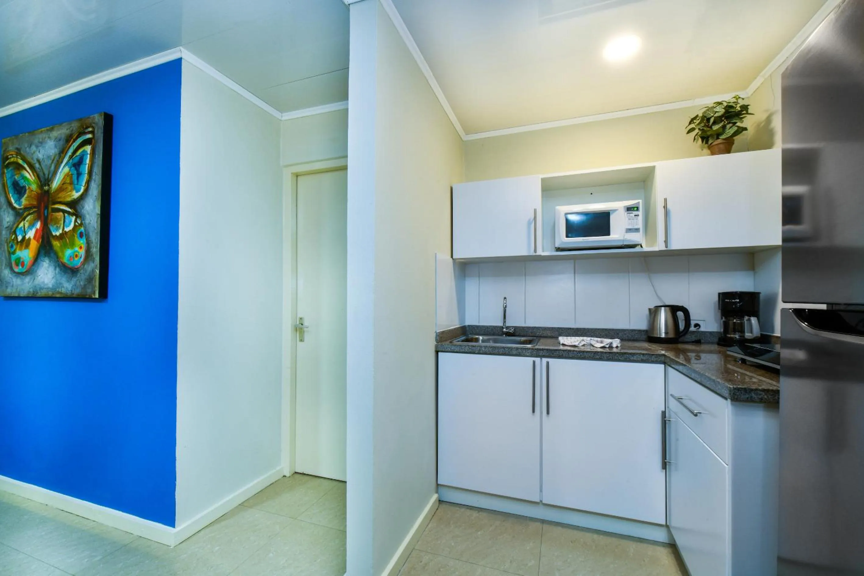 Kitchen or kitchenette in Aruba Blue Village Hotel and Apartments