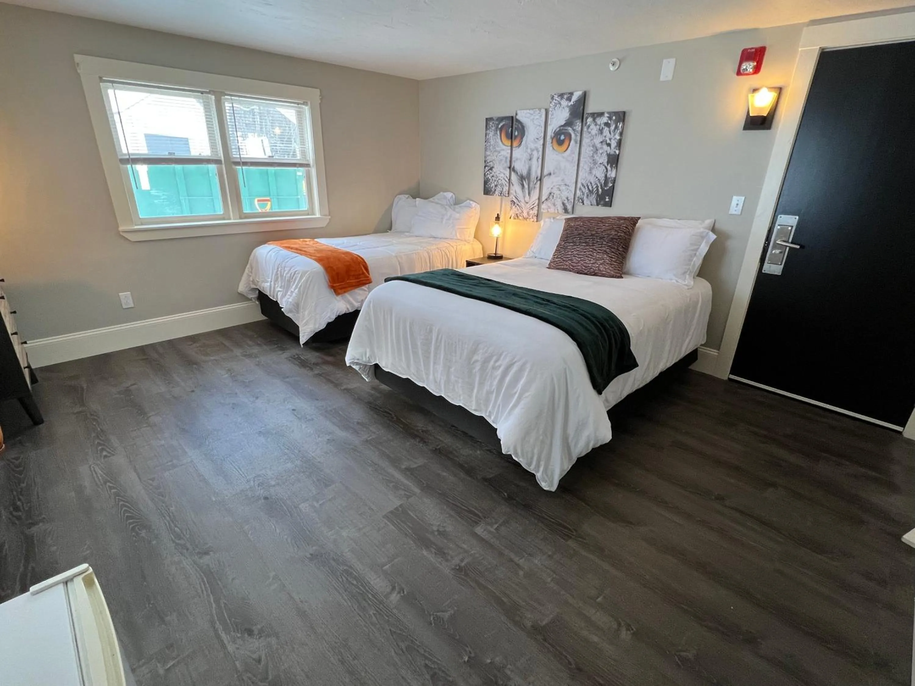 Bed in Gunstock Inn & Suites