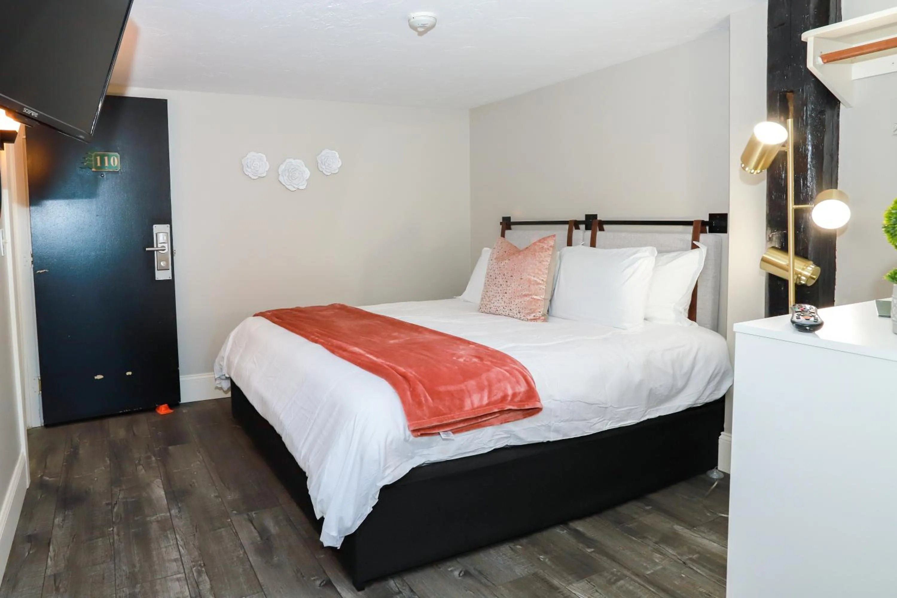 Bed in Gunstock Inn & Suites