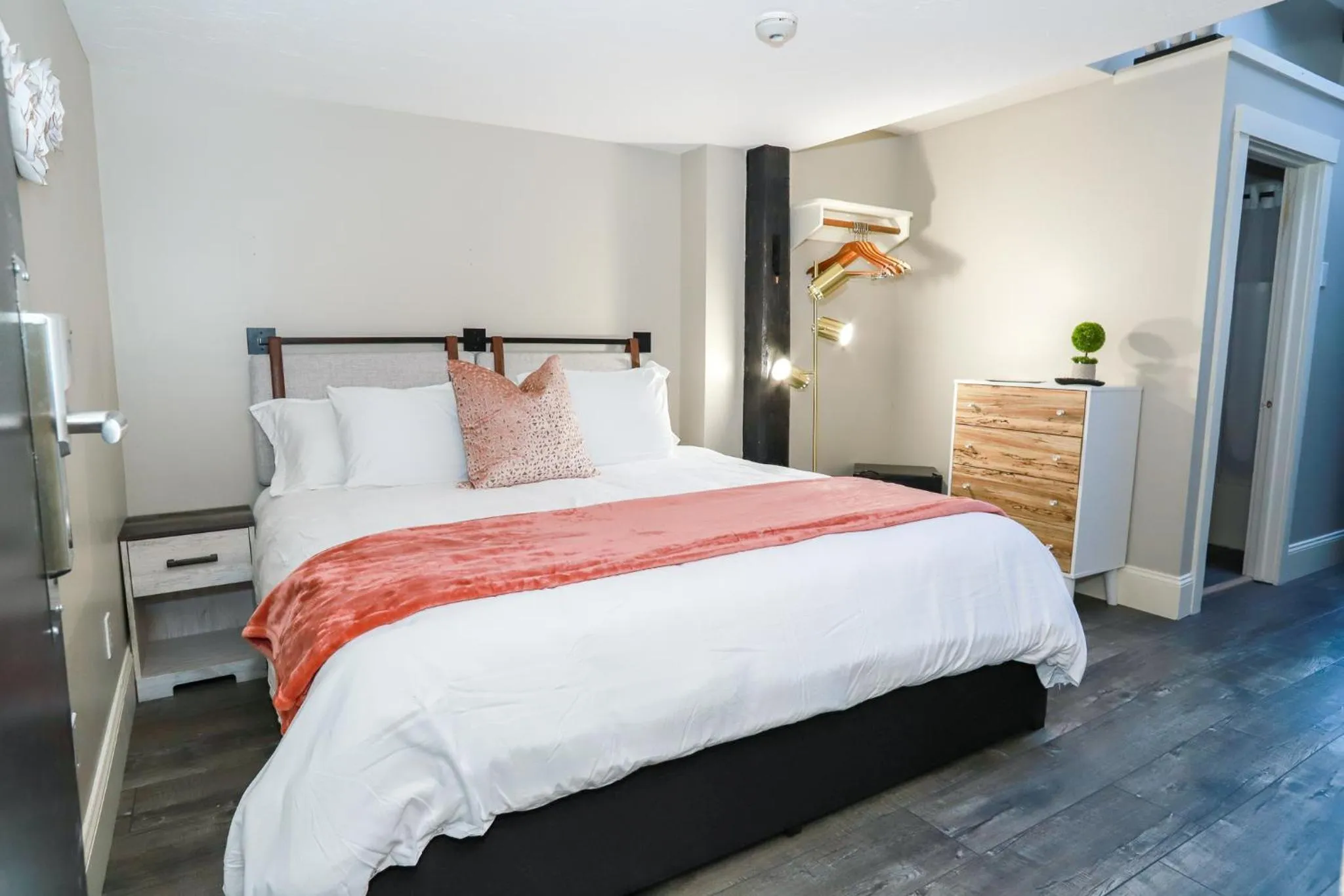 Bed in Gunstock Inn & Suites