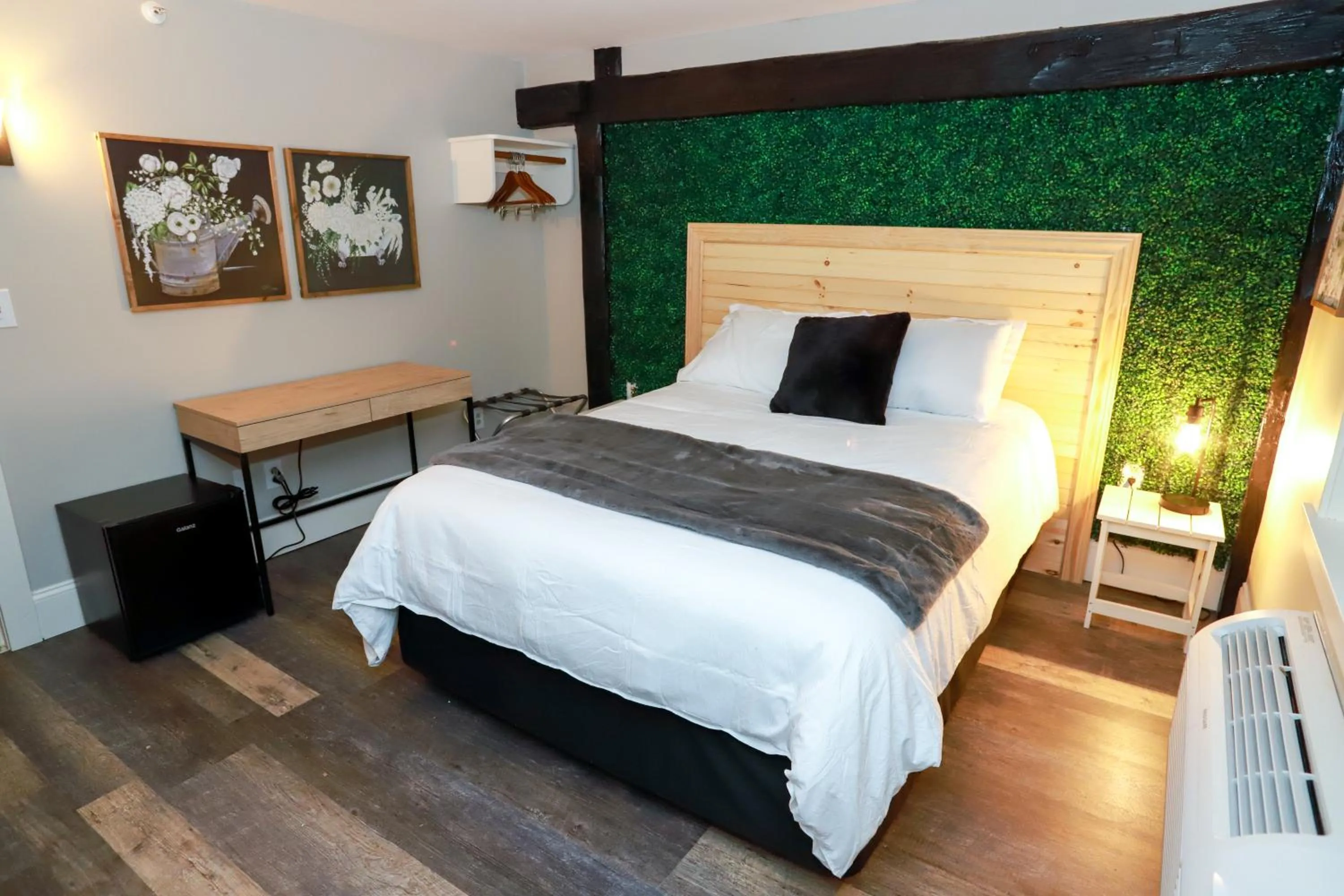 Bed in Gunstock Inn & Suites