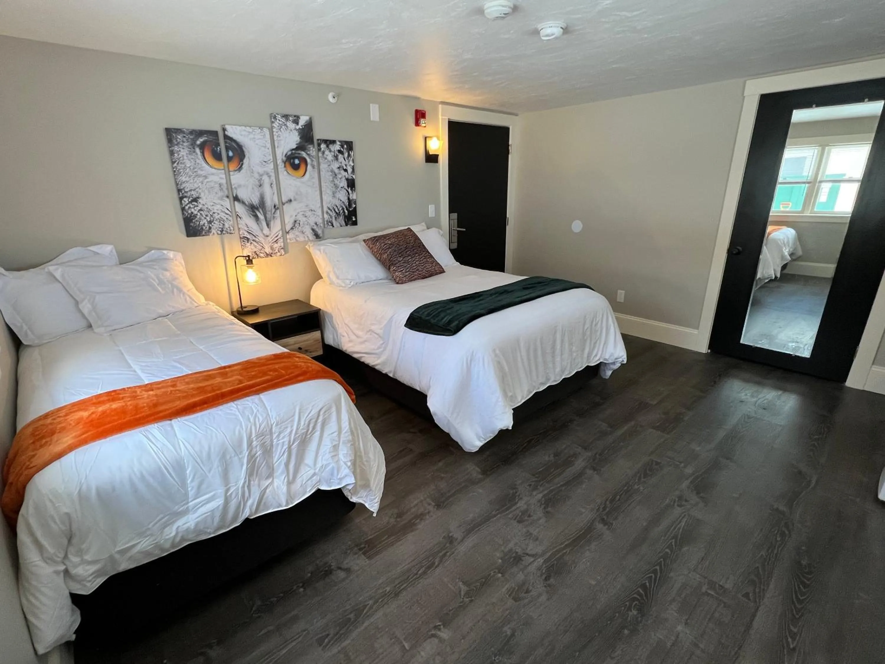 Bed in Gunstock Inn & Suites