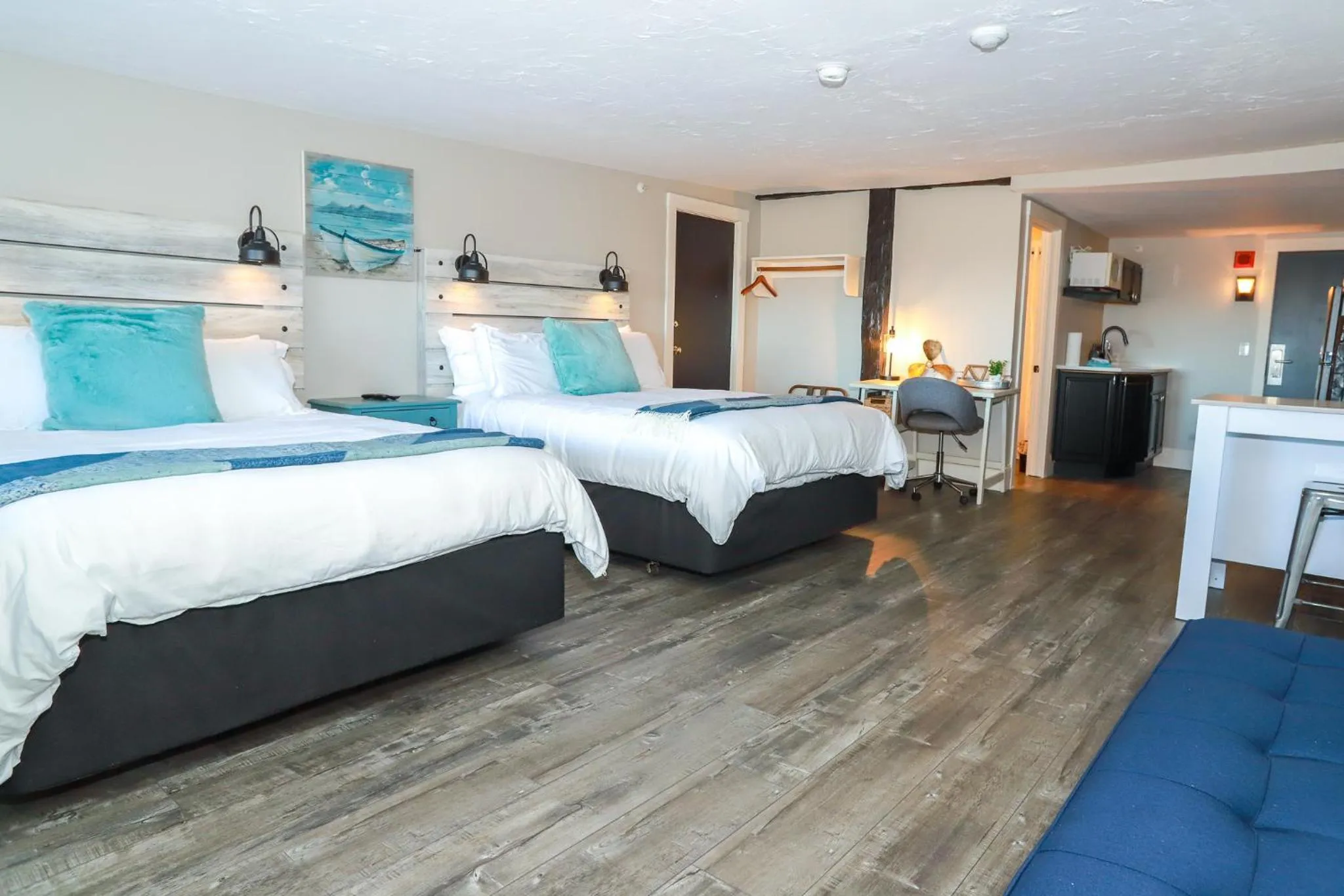 Bed in Gunstock Inn & Suites