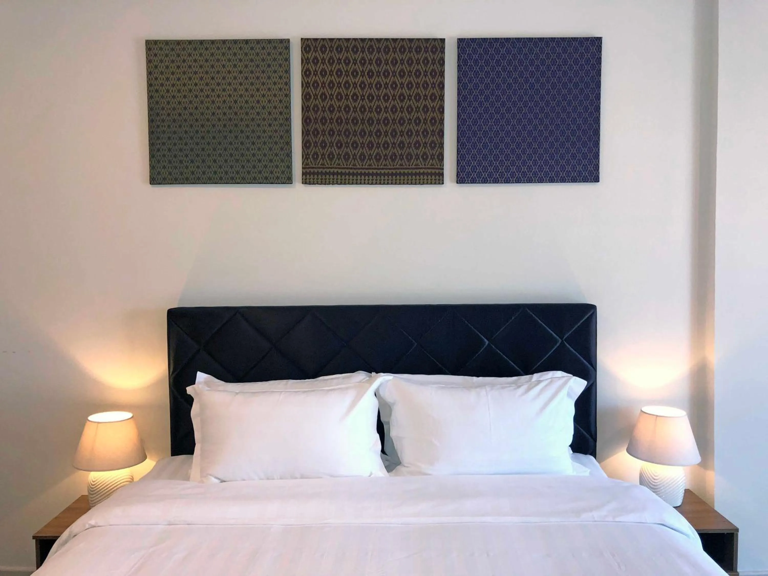 Bed in Aman Hills Hotel