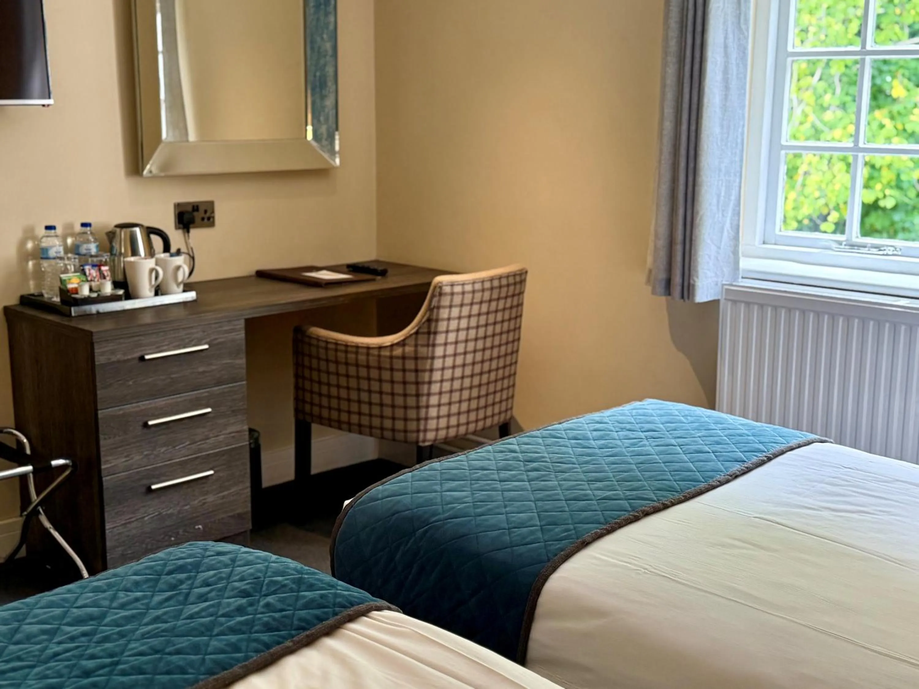 Bed in Wild Pheasant Hotel & Spa