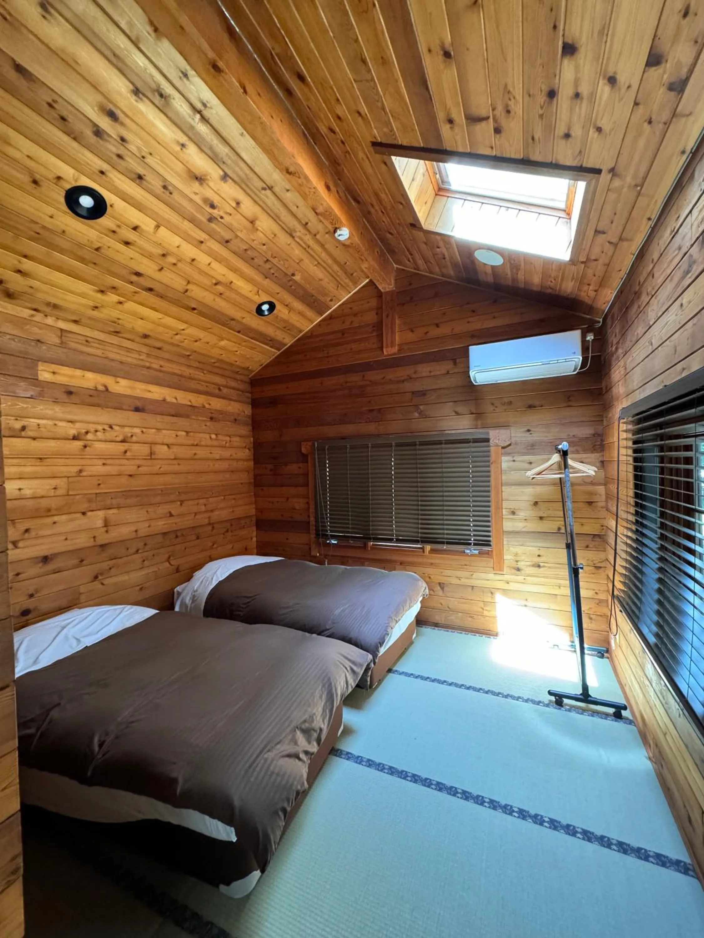 Bed in Hakuba Brownie Cottages