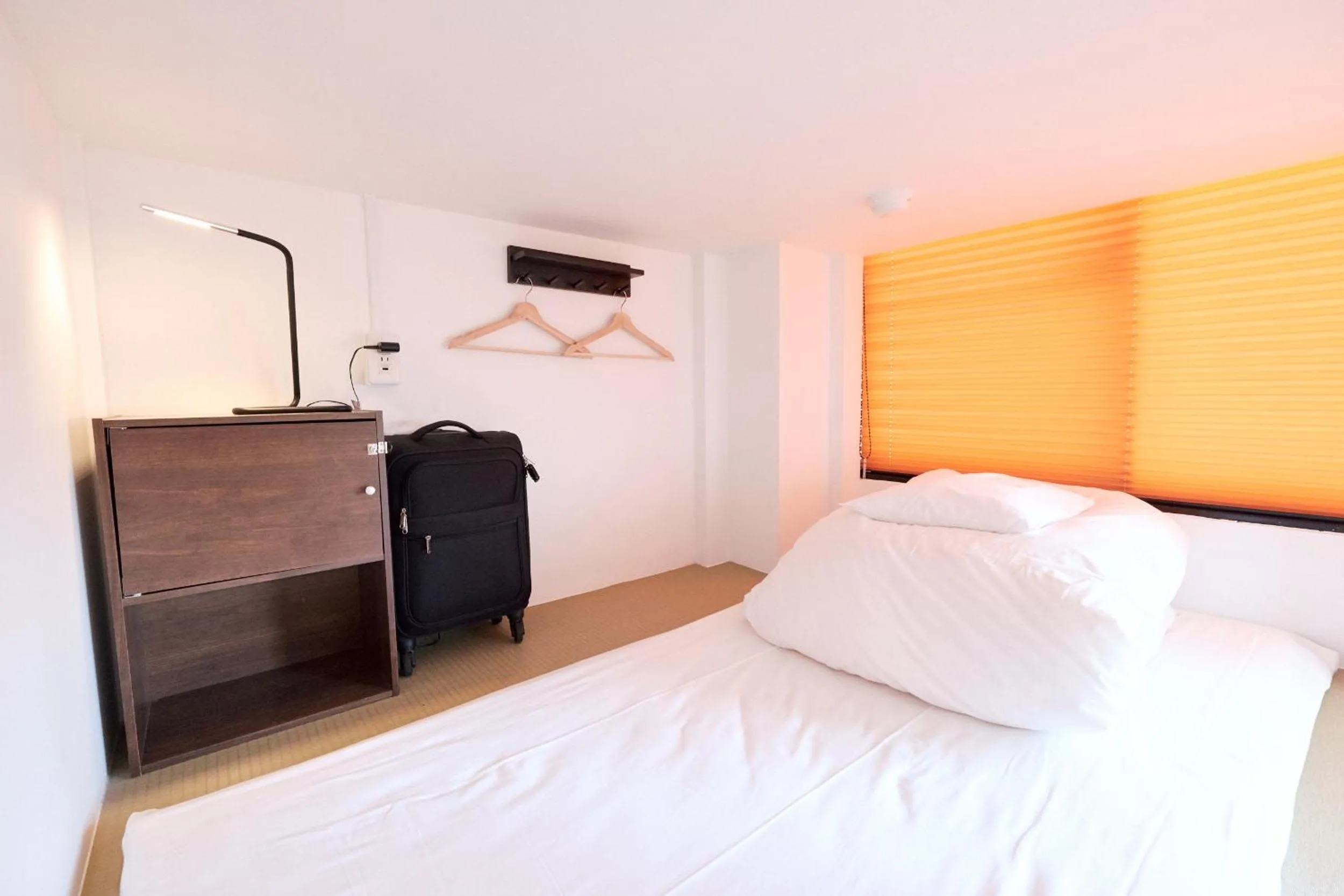 Bed in J-Hoppers Lake Biwa Guesthouse