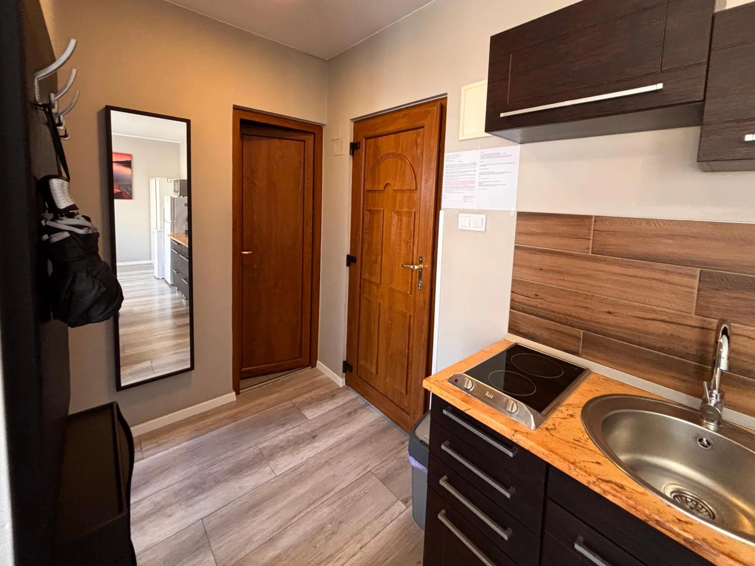 Kitchen or kitchenette in Dorina Wellness Apartman
