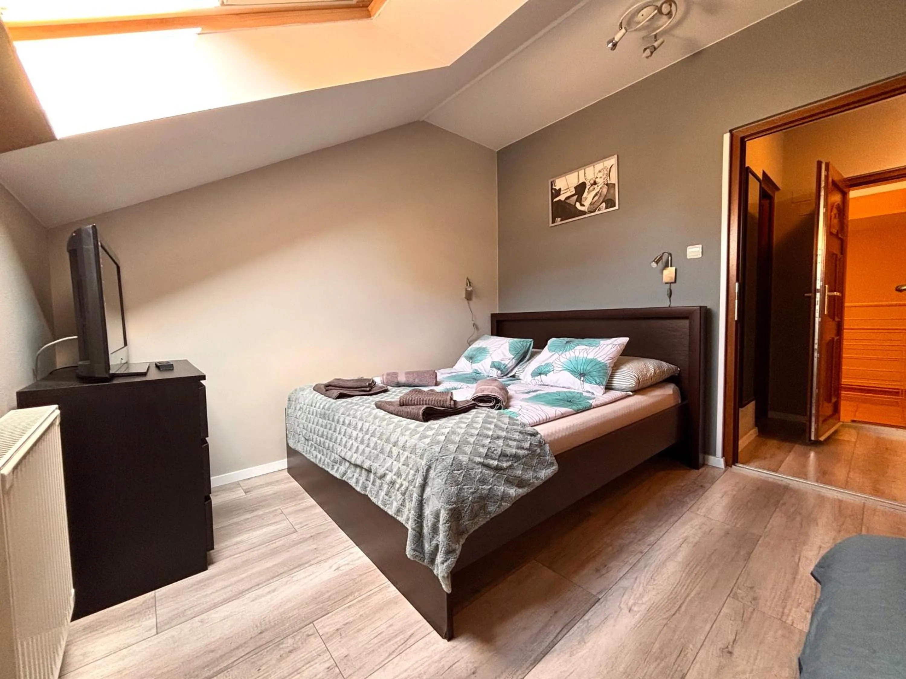 Bed in Dorina Wellness Apartman