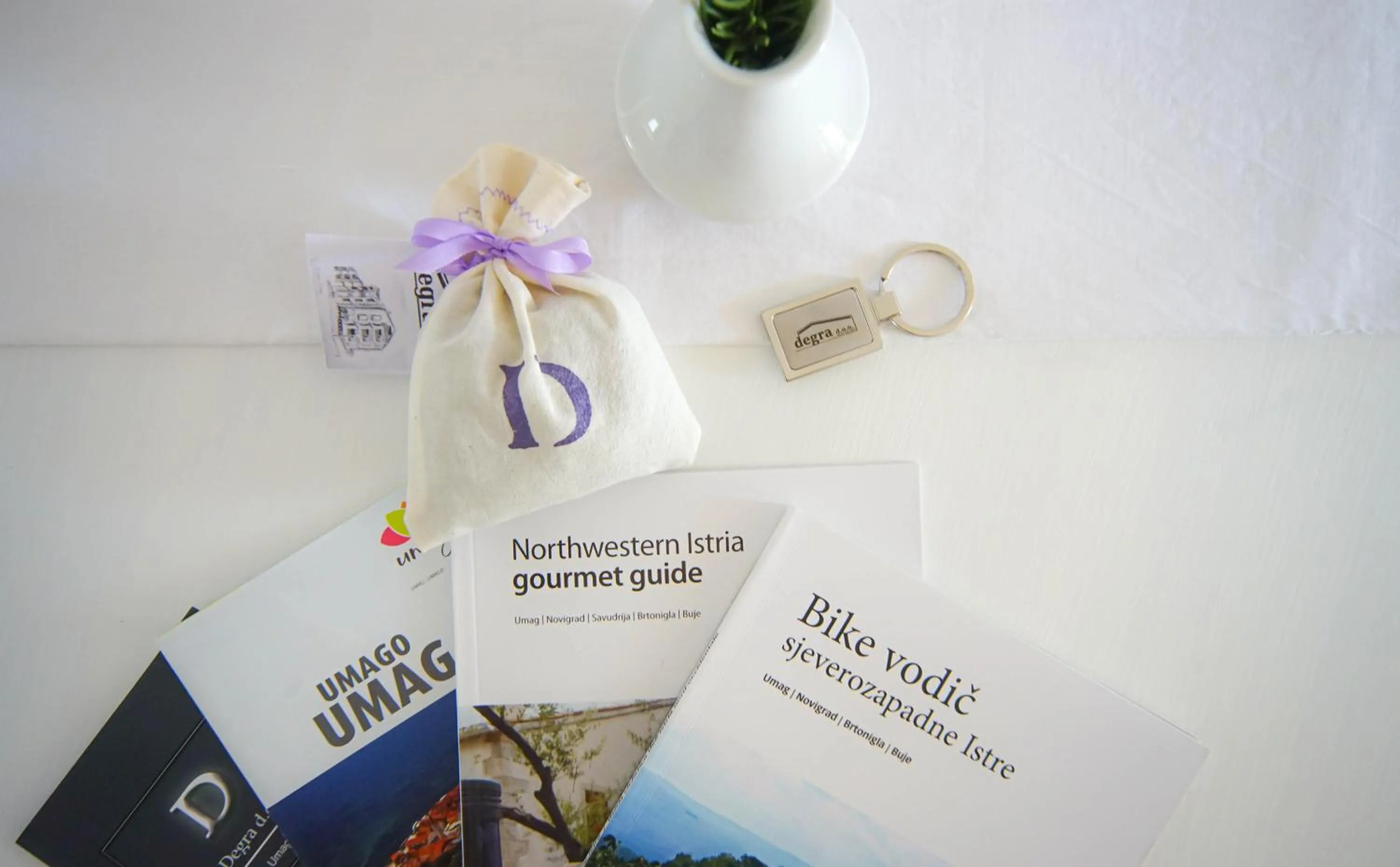 Property logo or sign in Apartments and Rooms Degra