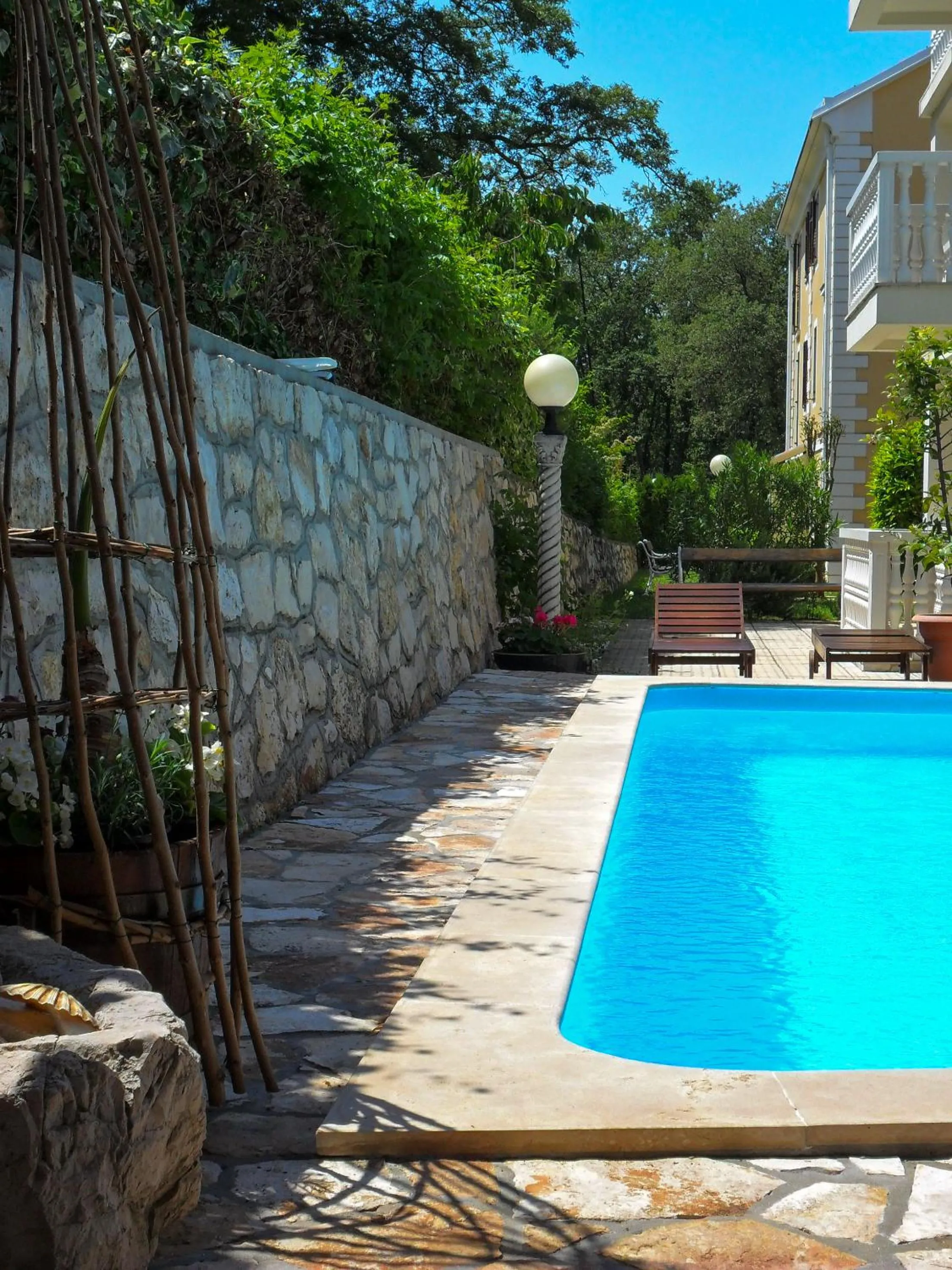 Swimming pool in Apartments and Rooms Degra