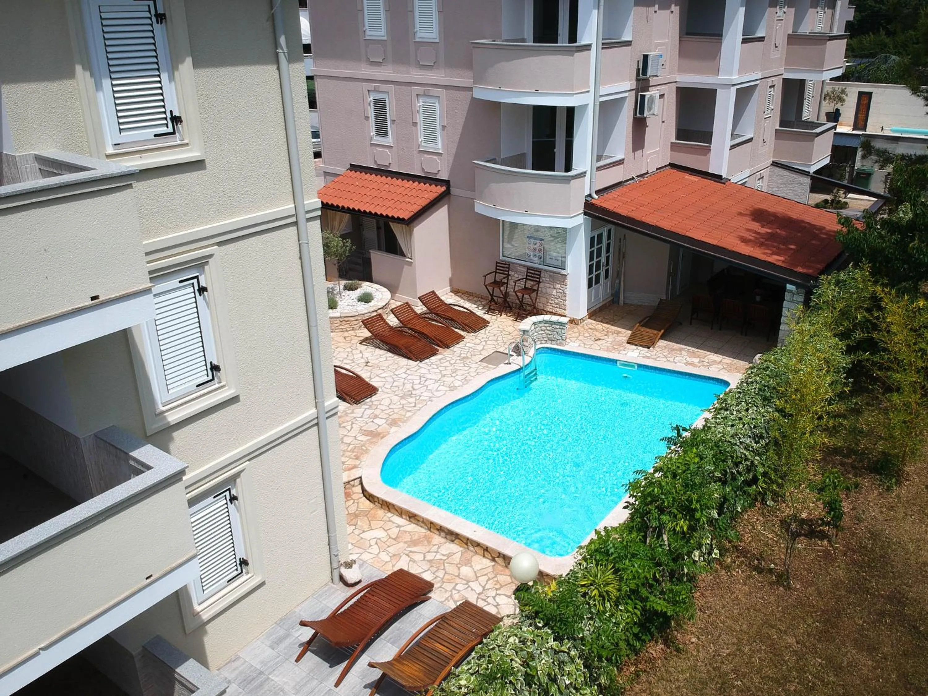 Pool view in Apartments and Rooms Degra