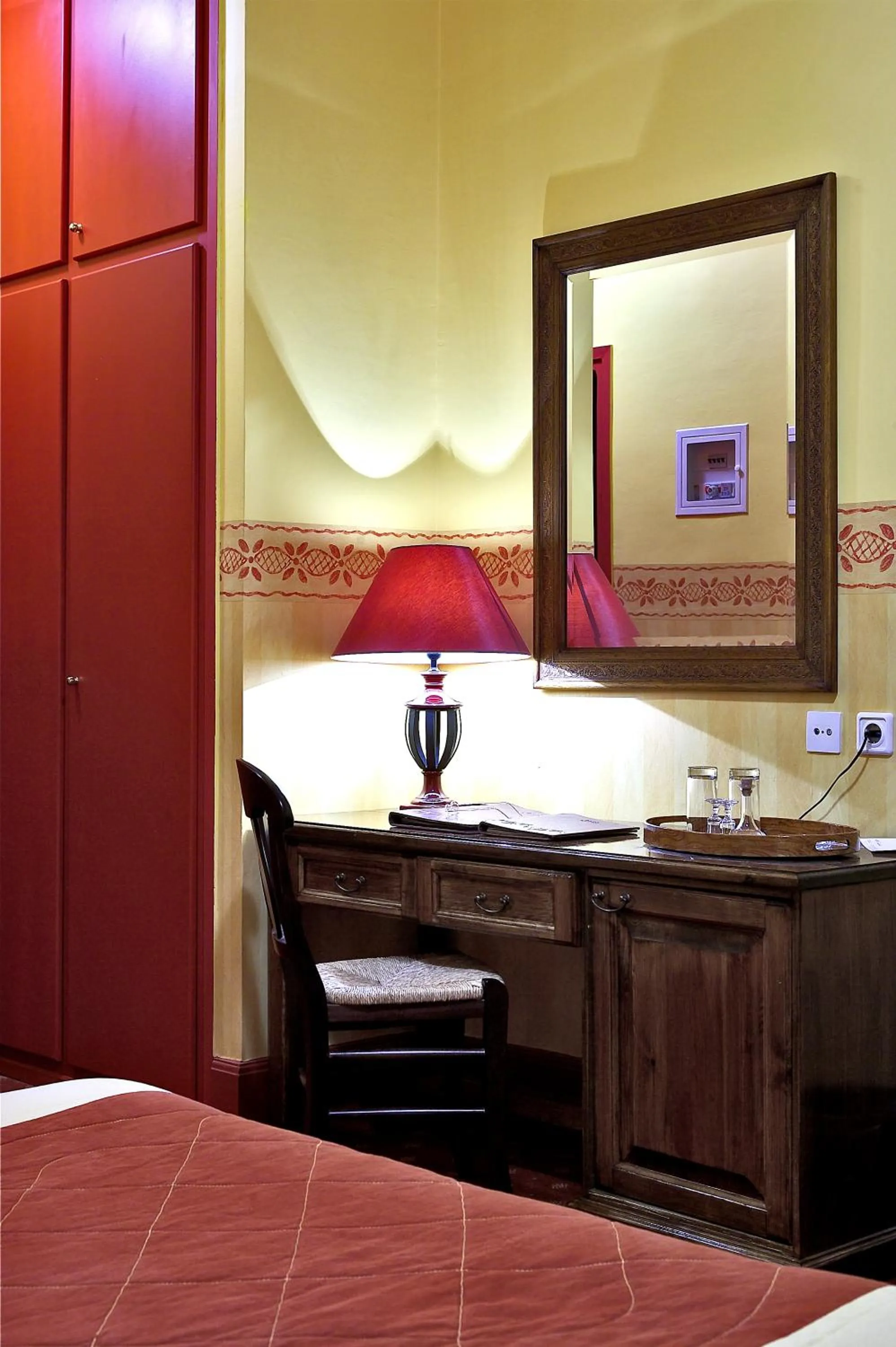 Bed in Country Club Hotel & Suites