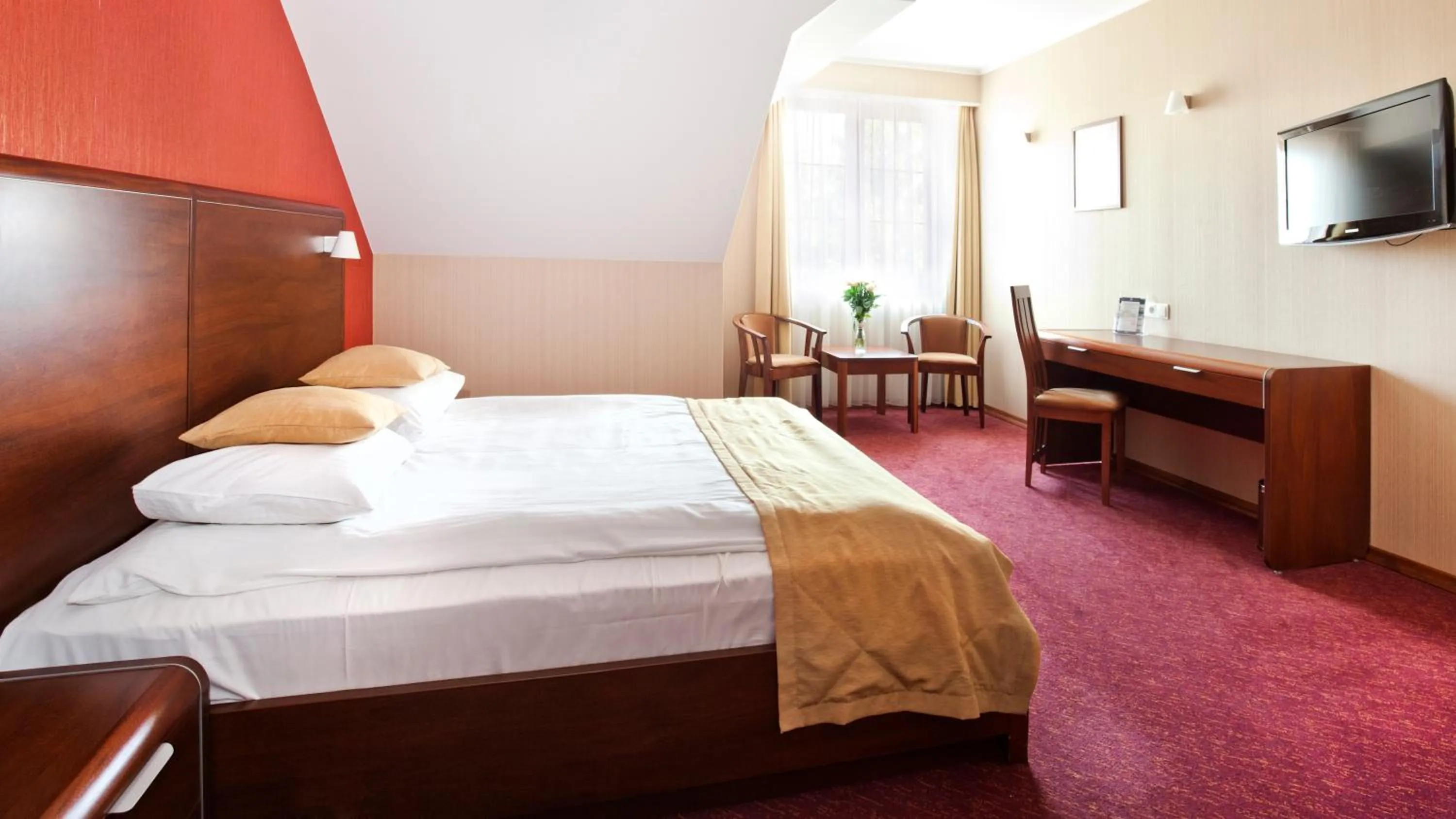 Bed in Artis Hotel & Spa