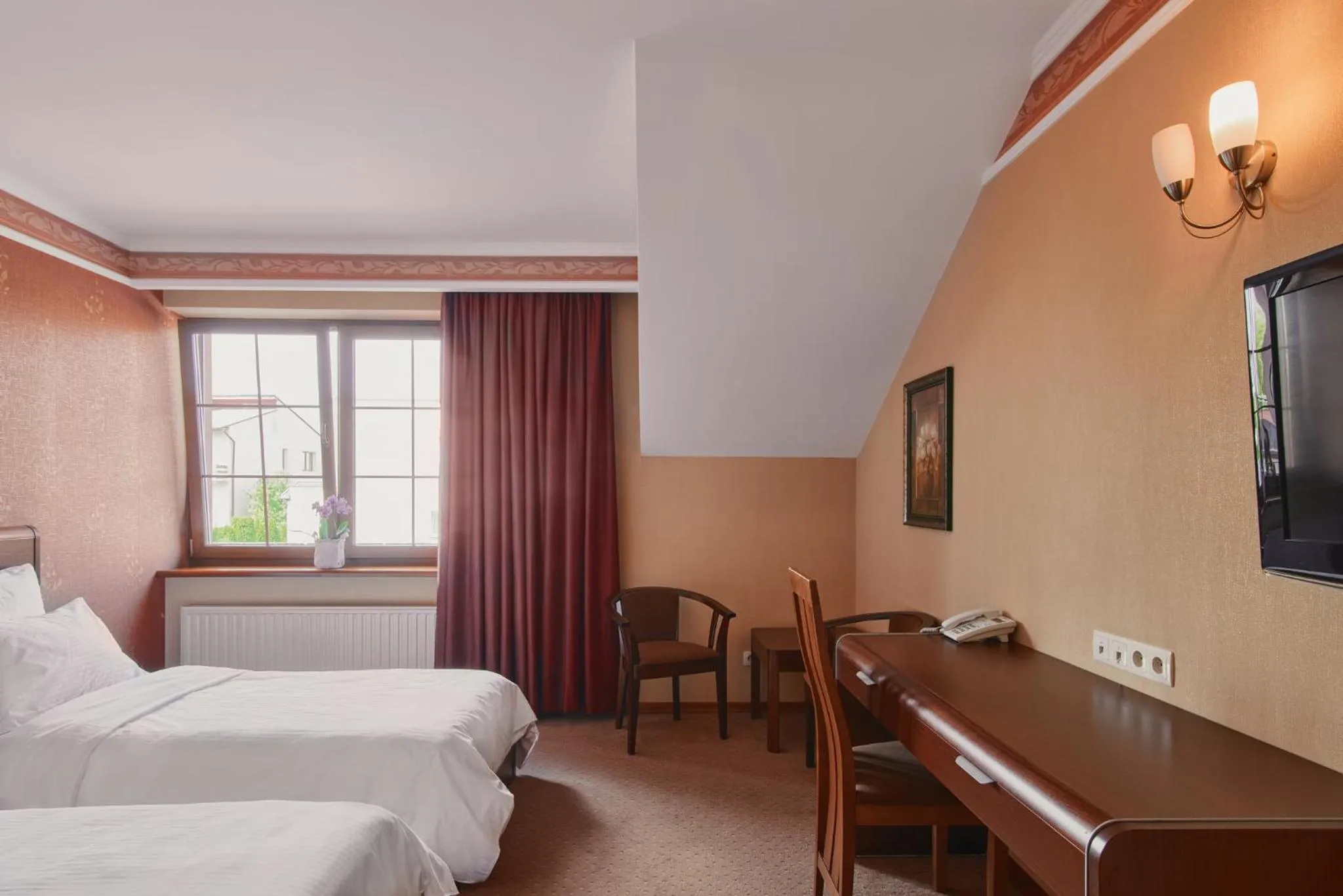 Bed in Artis Hotel & Spa