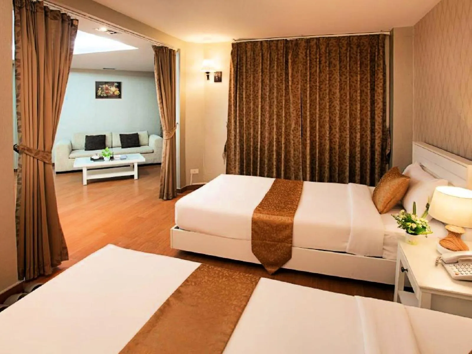 Bed in Summit Pavilion Hotel