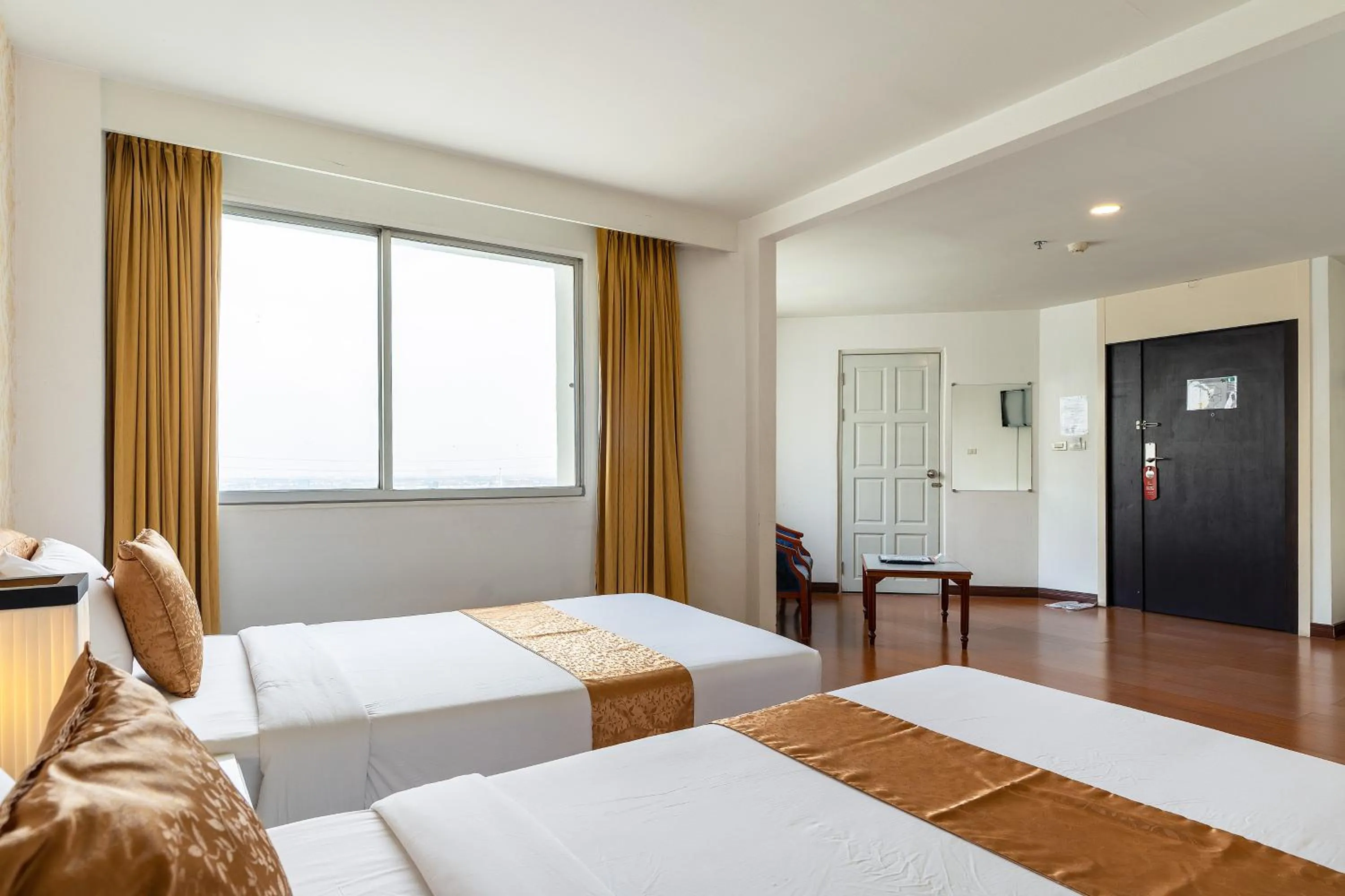 Bed in Summit Pavilion Hotel