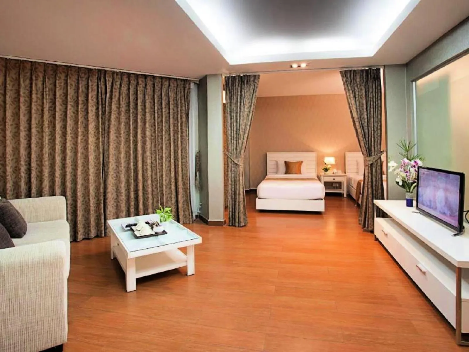 Bed in Summit Pavilion Hotel