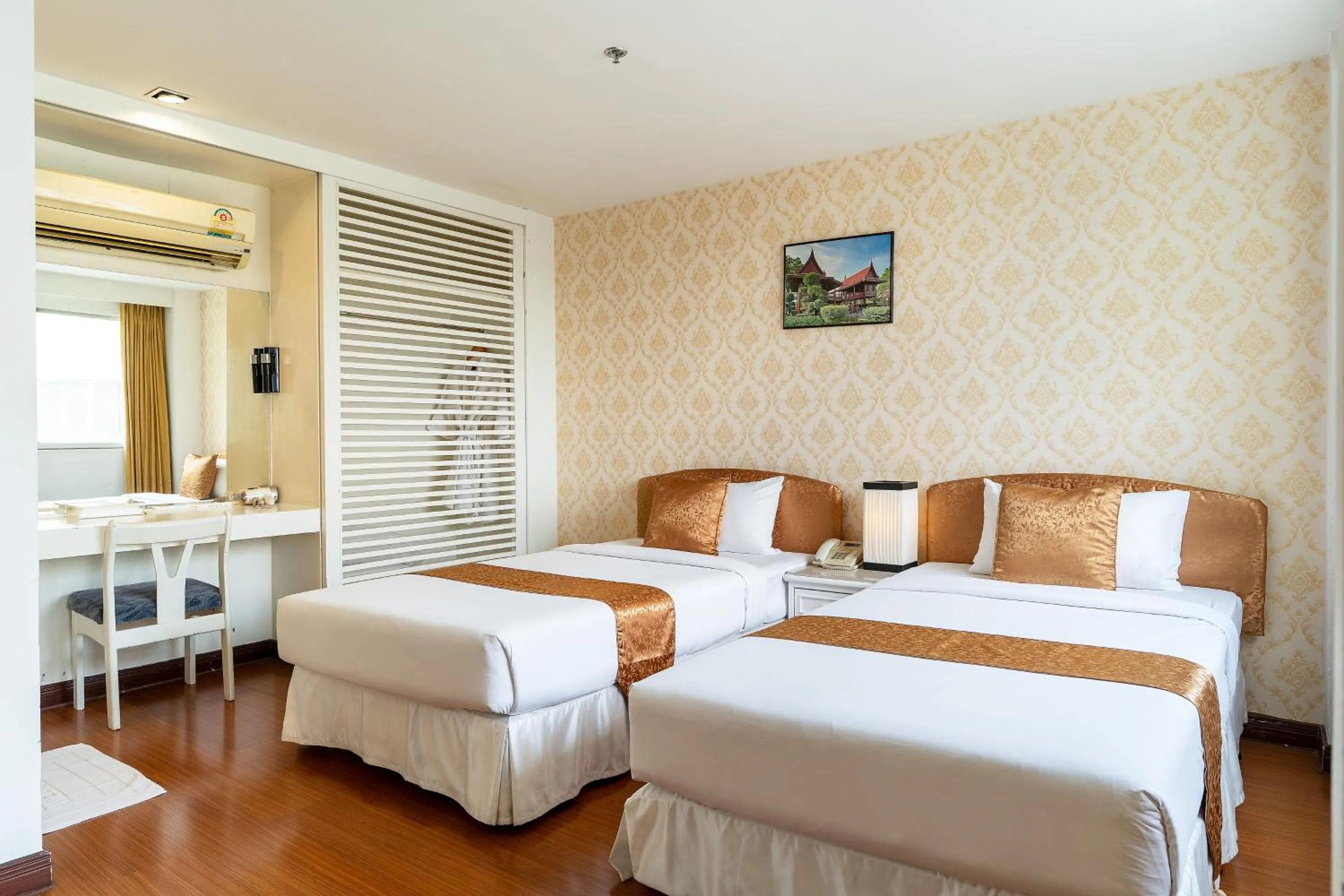 Bed in Summit Pavilion Hotel