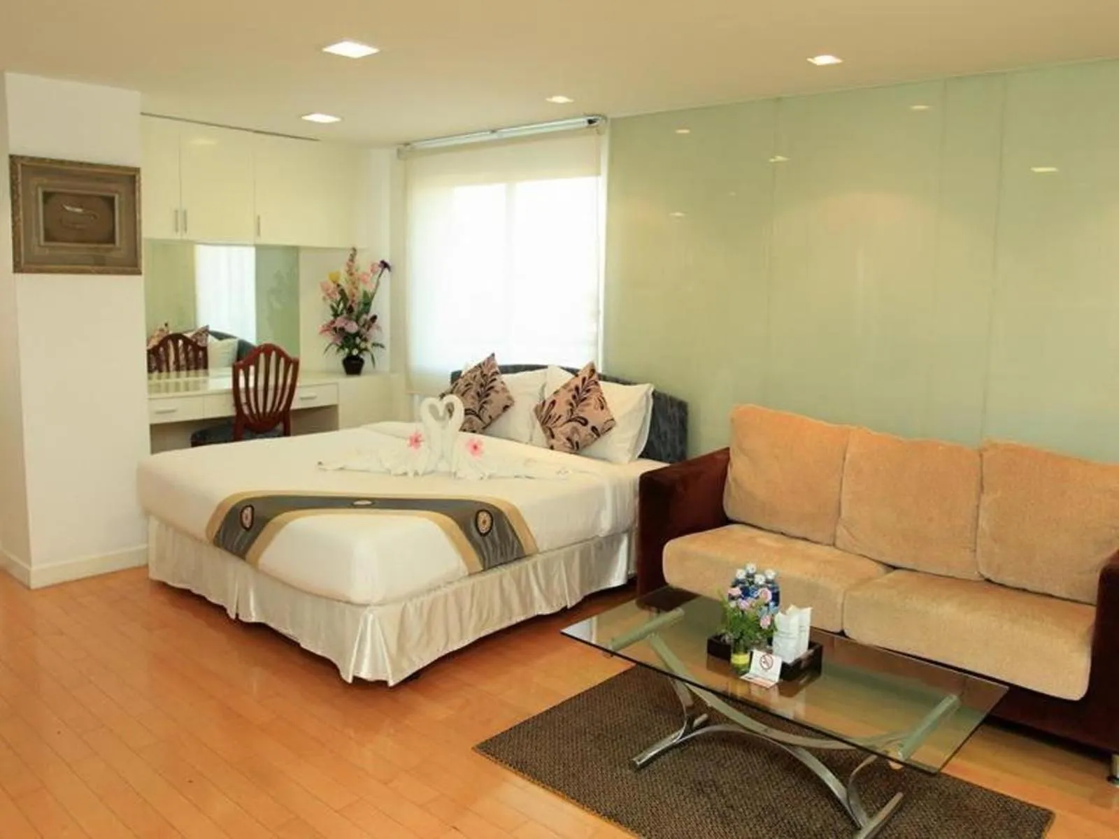 Bed in Summit Pavilion Hotel