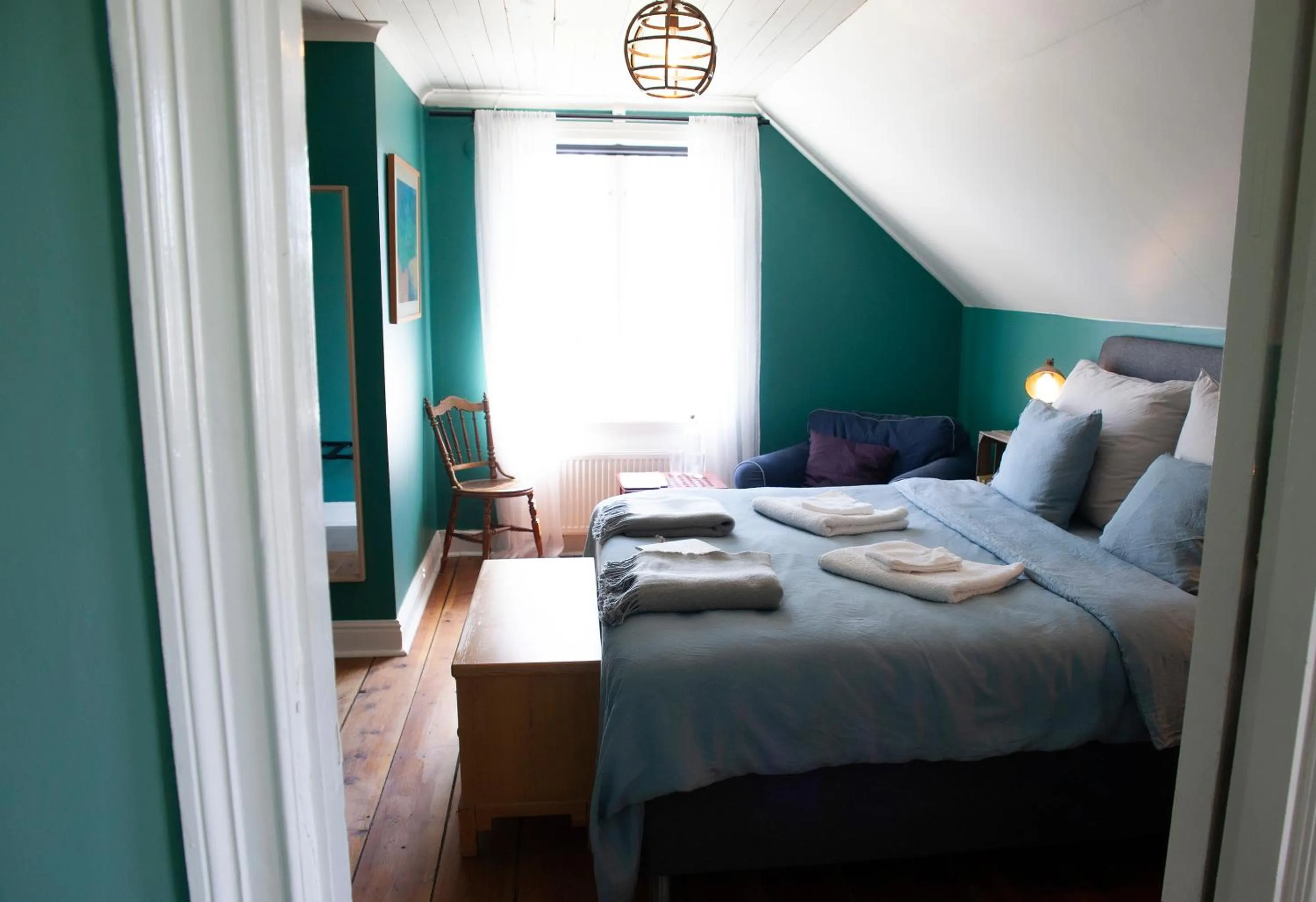 Bed in Three Pheasants Boutique Bed and Breakfast