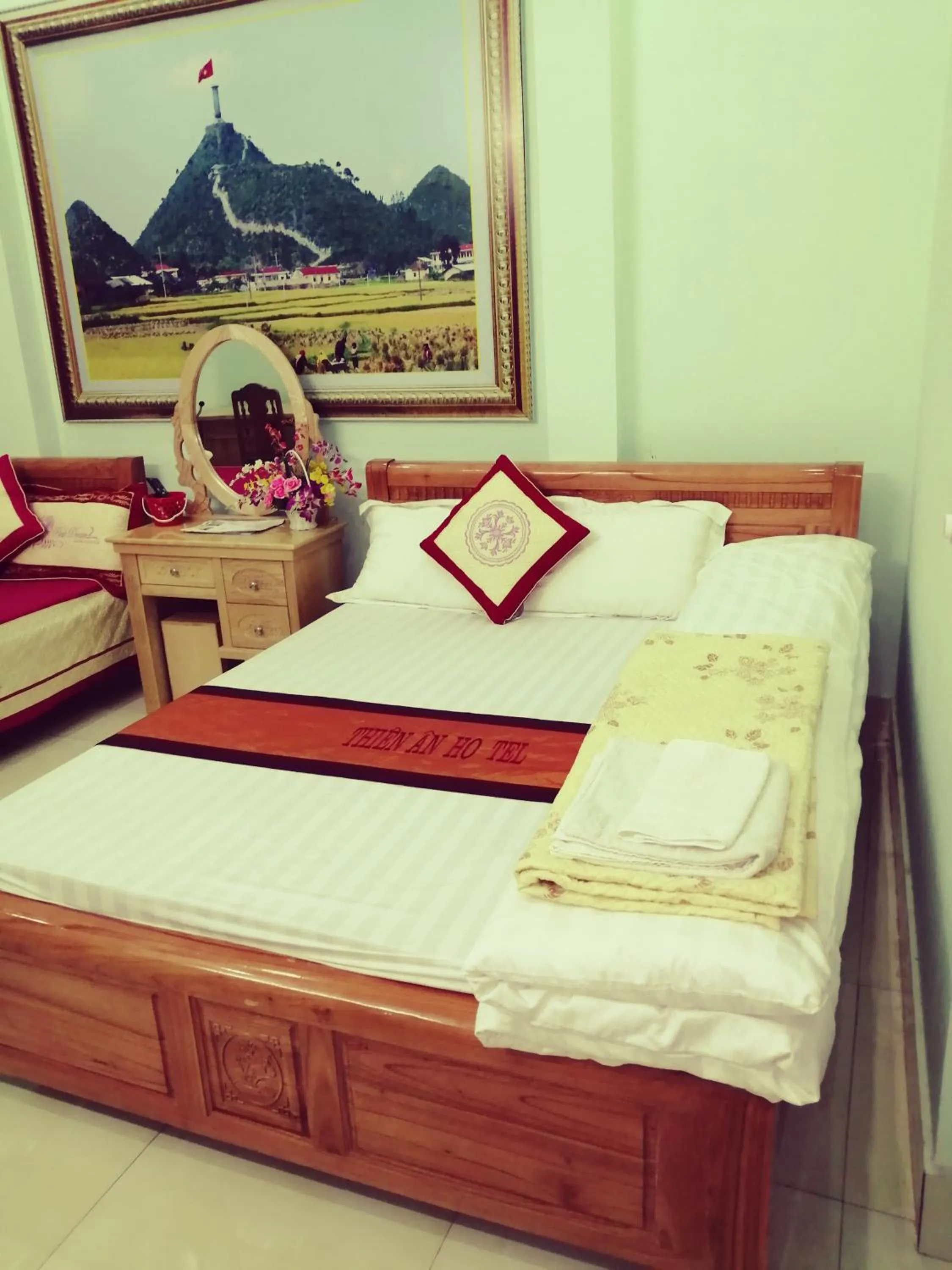 Bed in Yen Minh Hotel Thien An