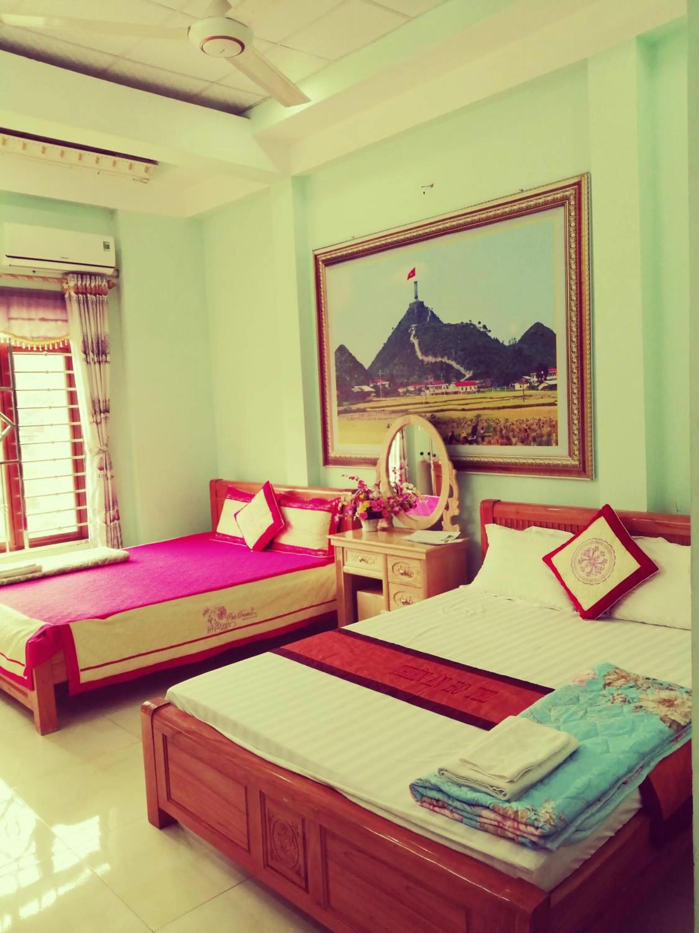 Bed in Yen Minh Hotel Thien An