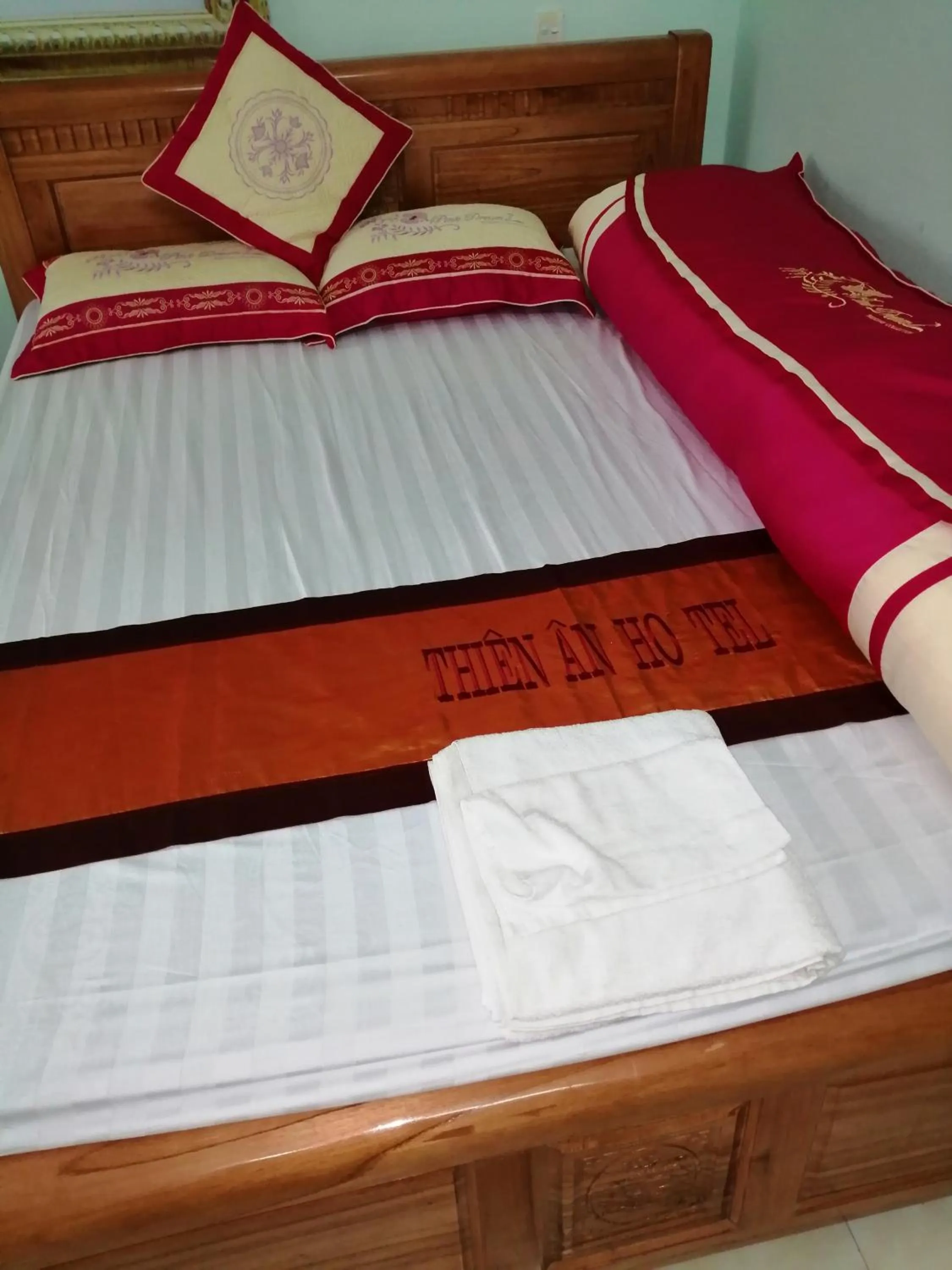 Bed in Yen Minh Hotel Thien An
