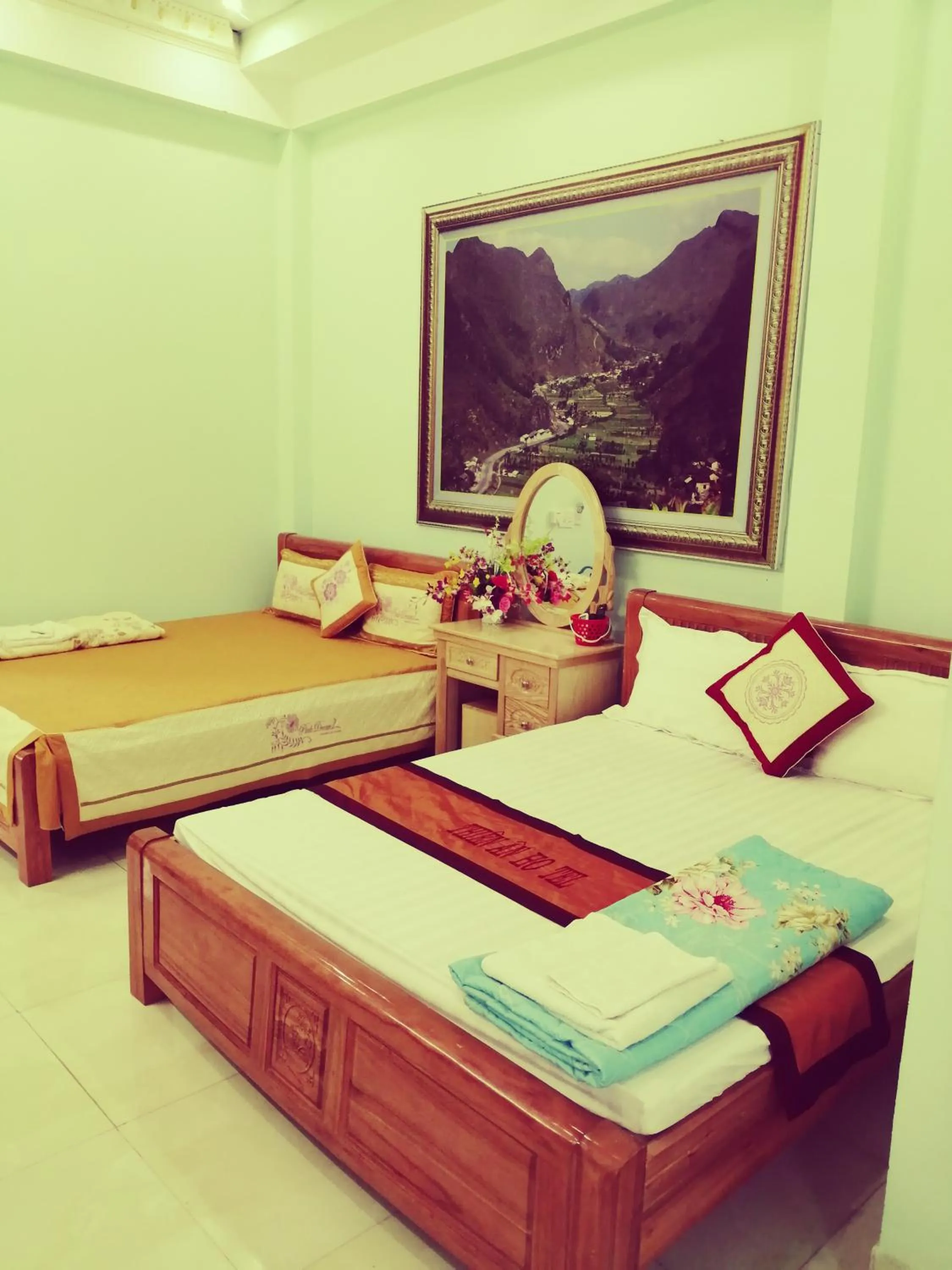 Bed in Yen Minh Hotel Thien An