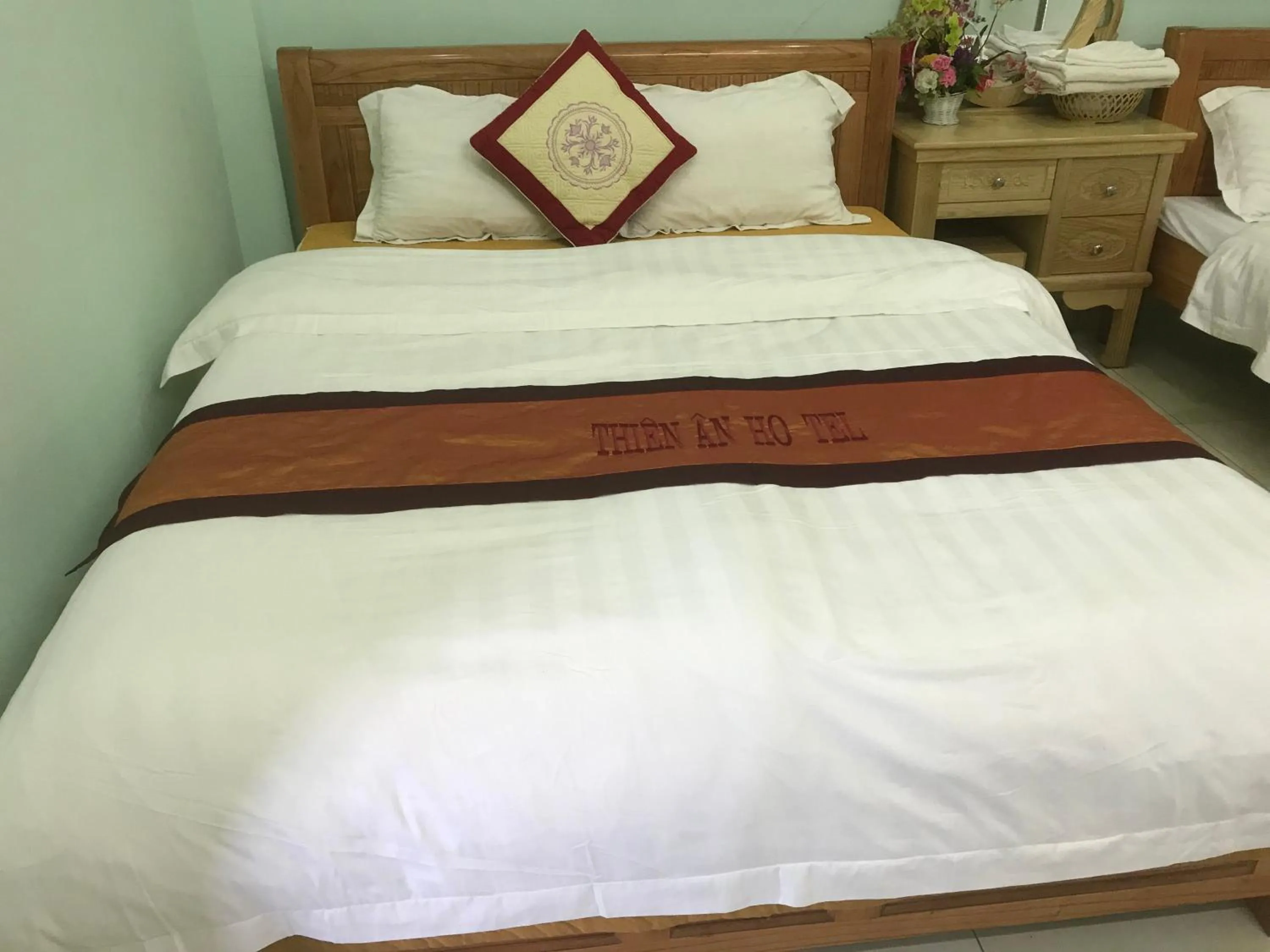 Bed in Yen Minh Hotel Thien An