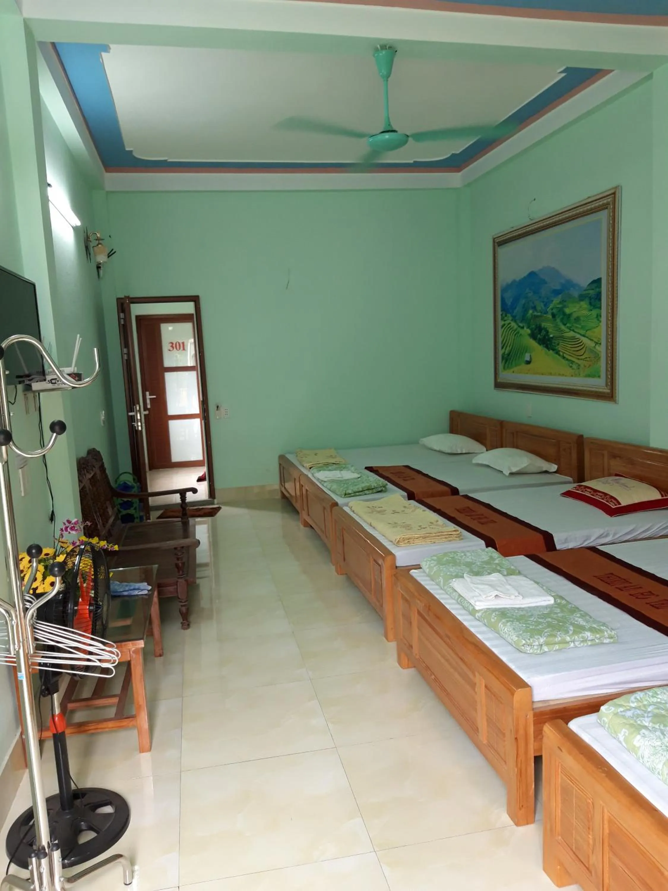 Bed in Yen Minh Hotel Thien An