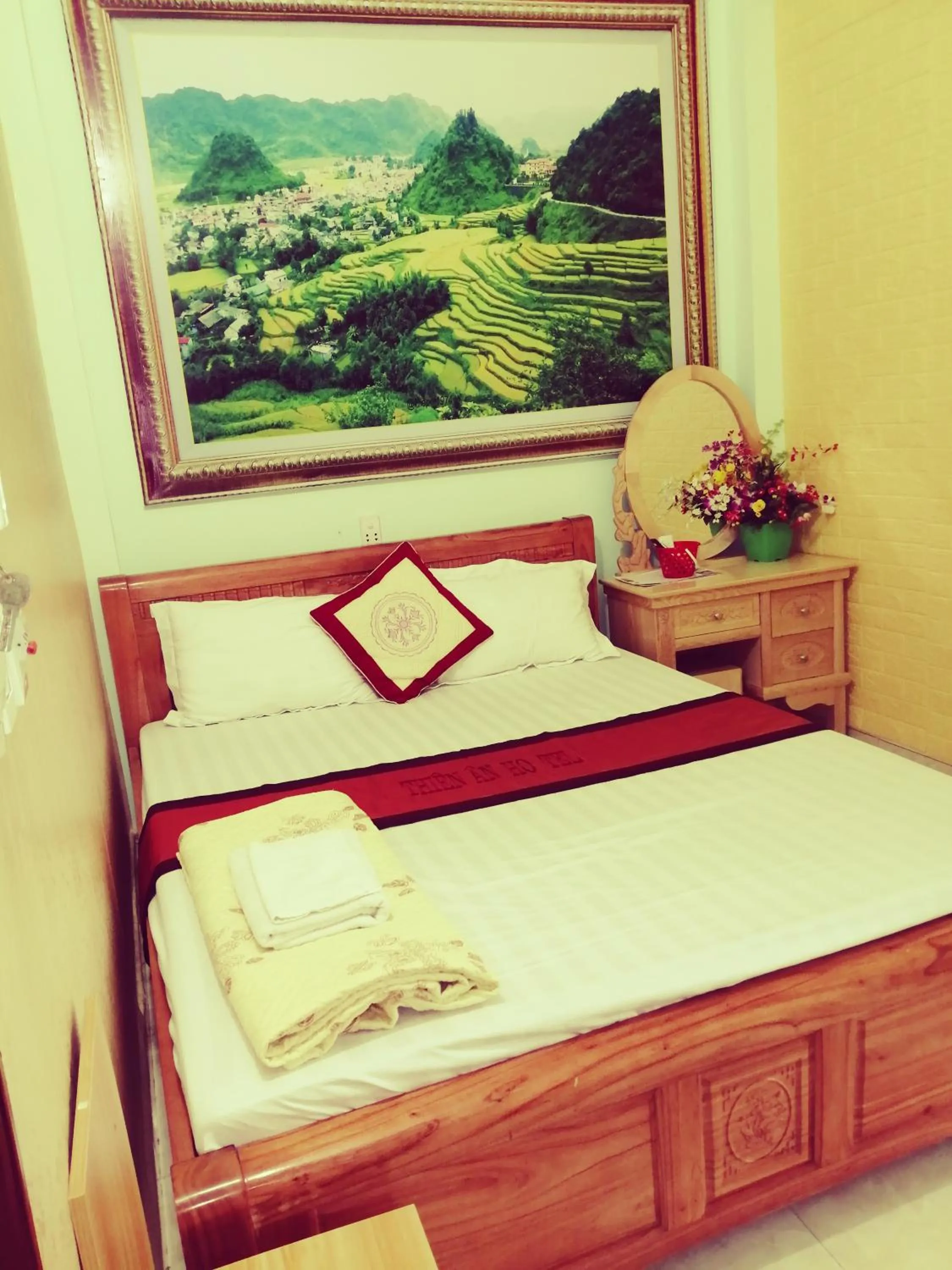 Bed in Yen Minh Hotel Thien An